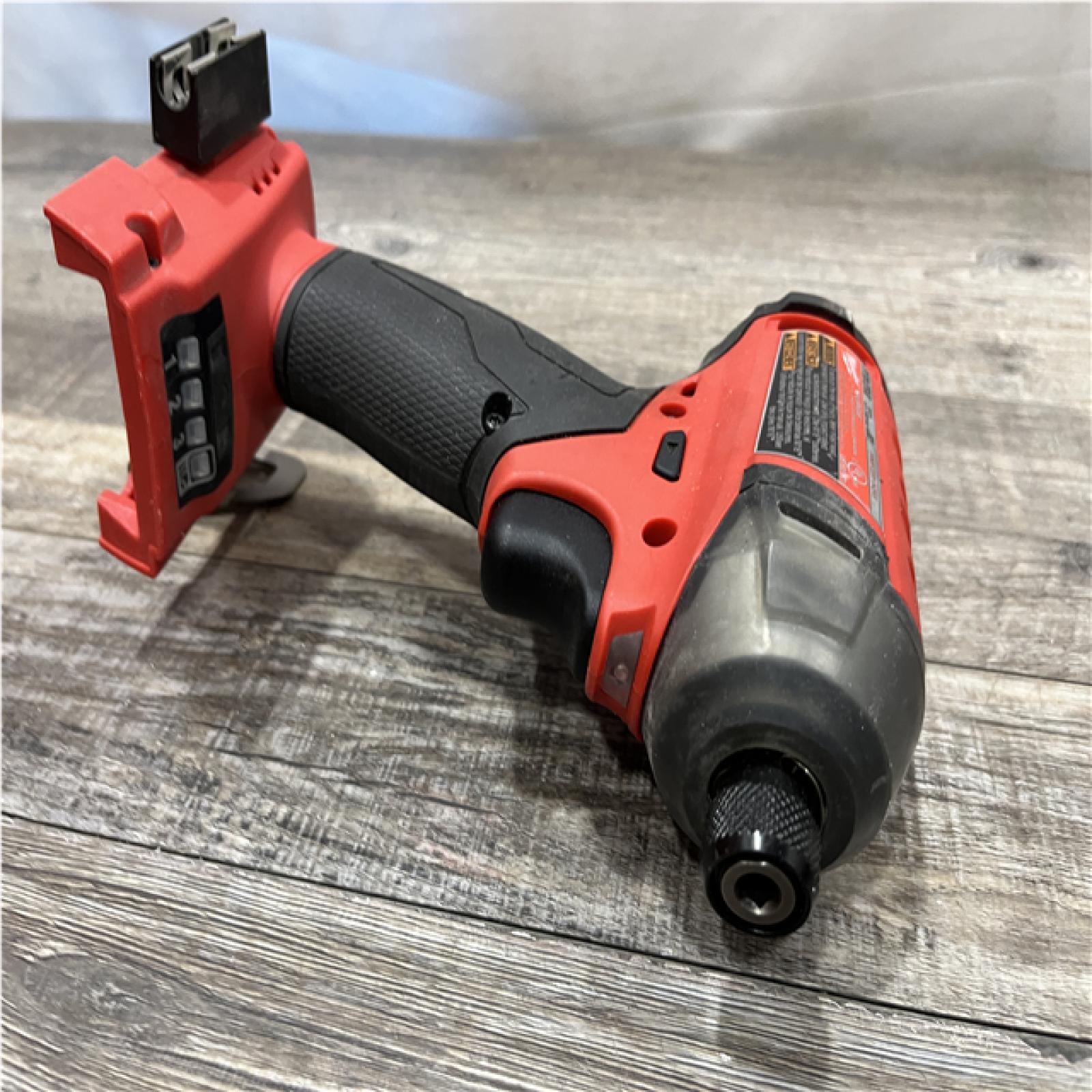 AS-IS Milwaukee FUEL SURGE 18-Volt Lithium-Ion Brushless Cordless 1/4 in. Hex Impact Driver Compact Kit