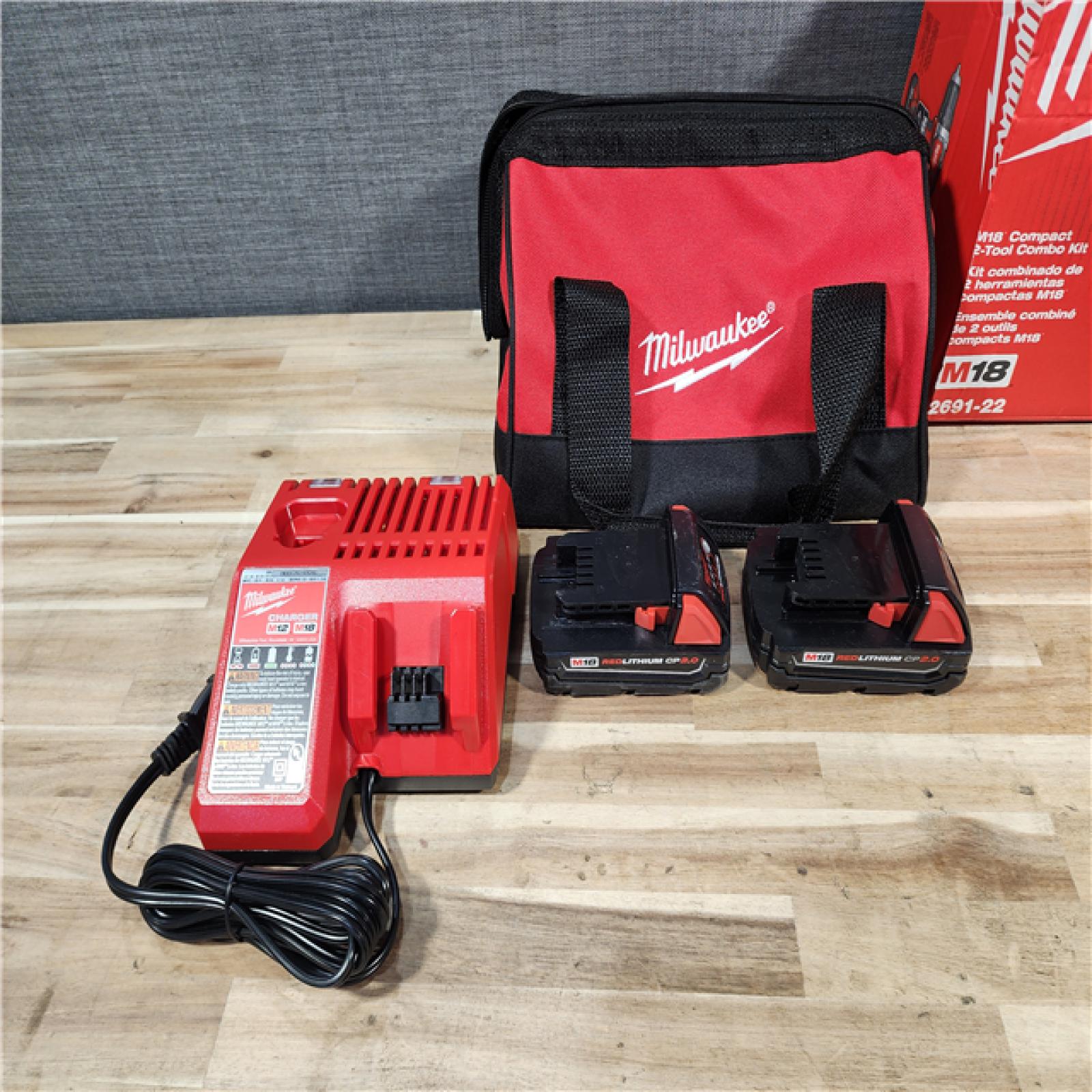 HOUSTON LOCATION - AS-IS Milwaukee 18V Lithium-Ion Cordless Drill Driver/Impact Driver Combo Kit
