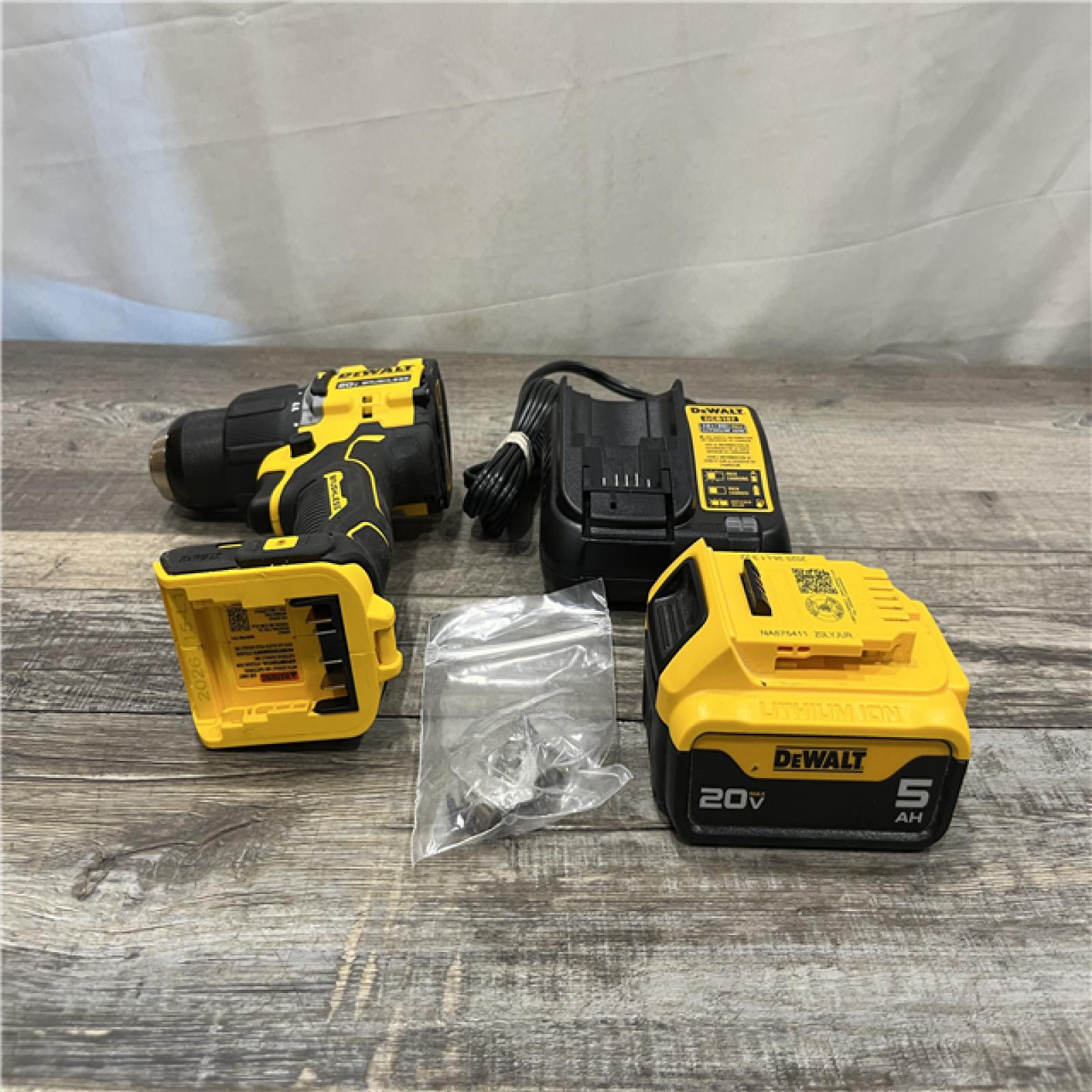 AS-IS DEWALT ATOMIC 20V Lithium-Ion Cordless 1/2 in. Hammer Drill Kit