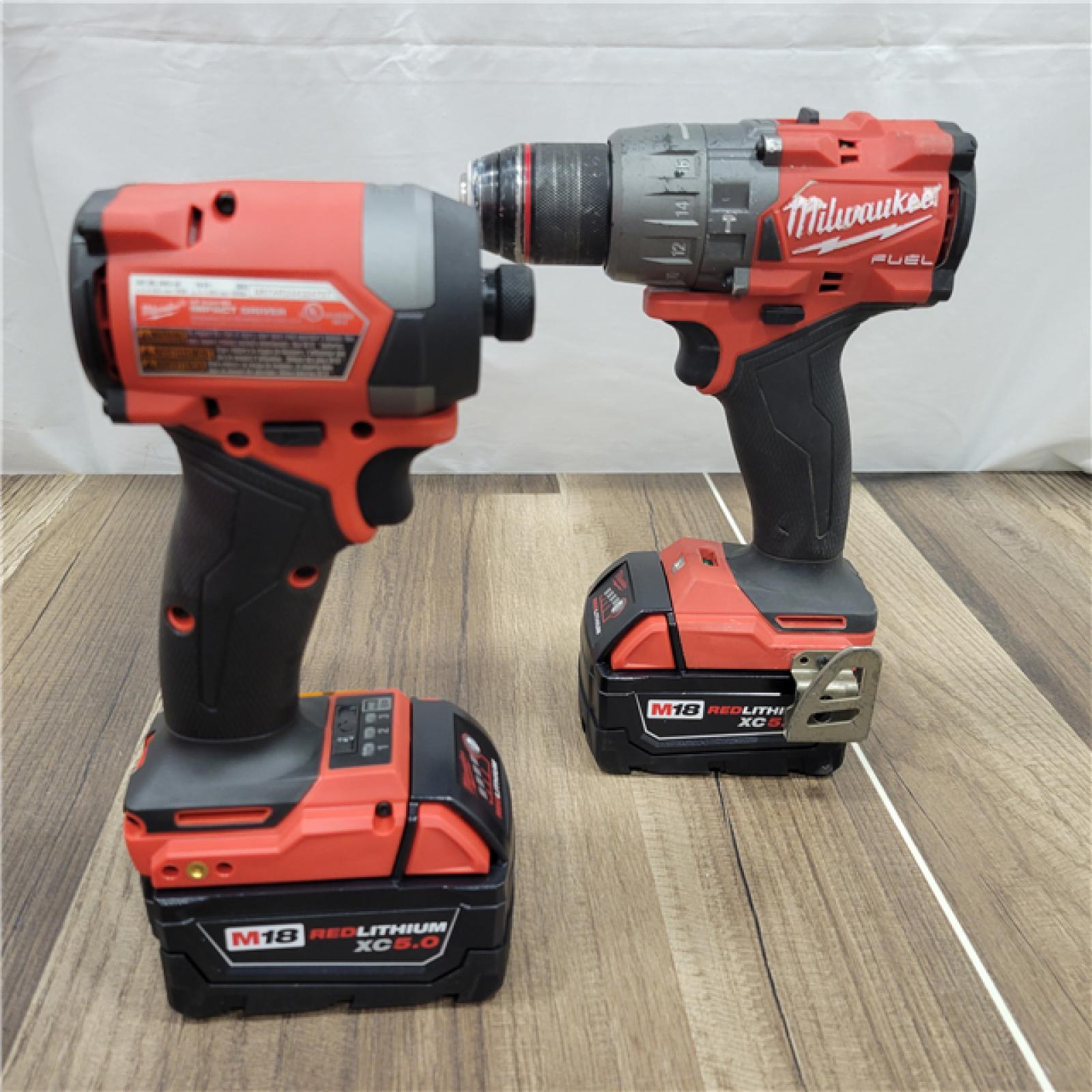 AS-IS  Milwaukee M18 FUEL 18V Lithium-Ion Brushless Cordless Hammer Drill and Impact Driver Combo Kit (2-Tool) with 2 Batteries