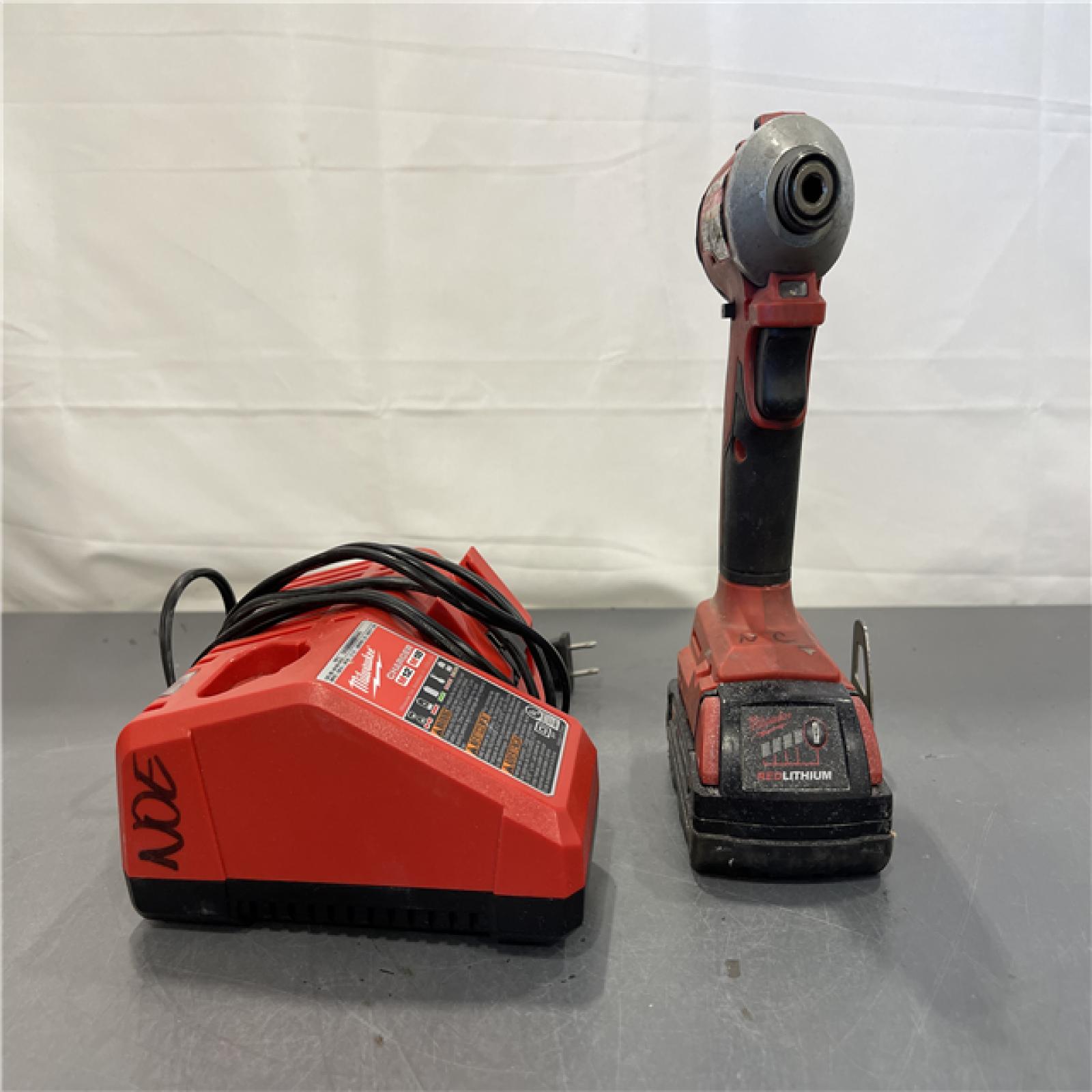 AS-IS - Milwaukee M18 18-Volt Lithium-Ion Compact Brushless Cordless 1/4 in. Impact Driver Kit