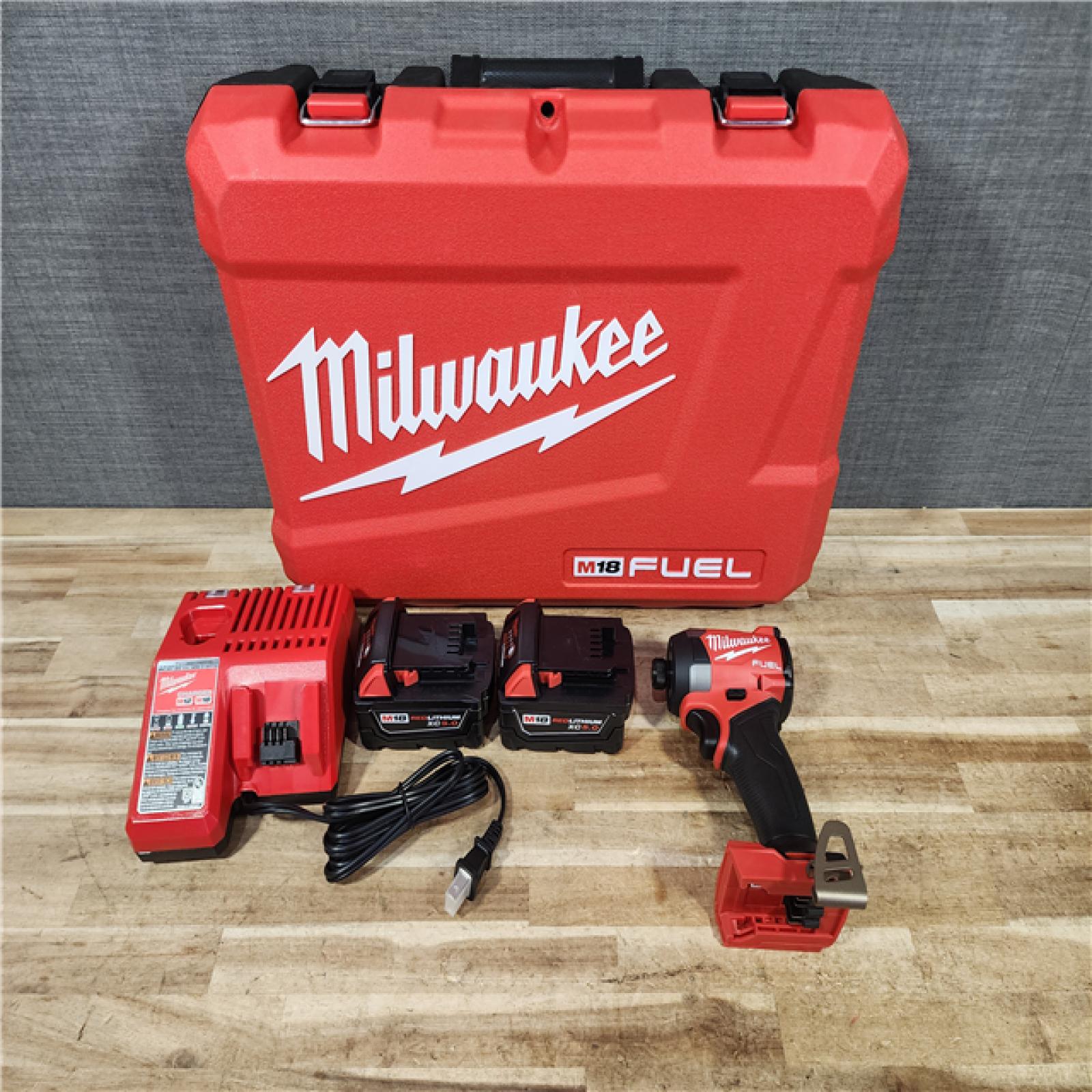 HOUSTON LOCATION - AS - IS Milwaukee FUEL 18V Lithium-Ion Brushless Cordless 1/4 in. Hex Impact Driver Kit