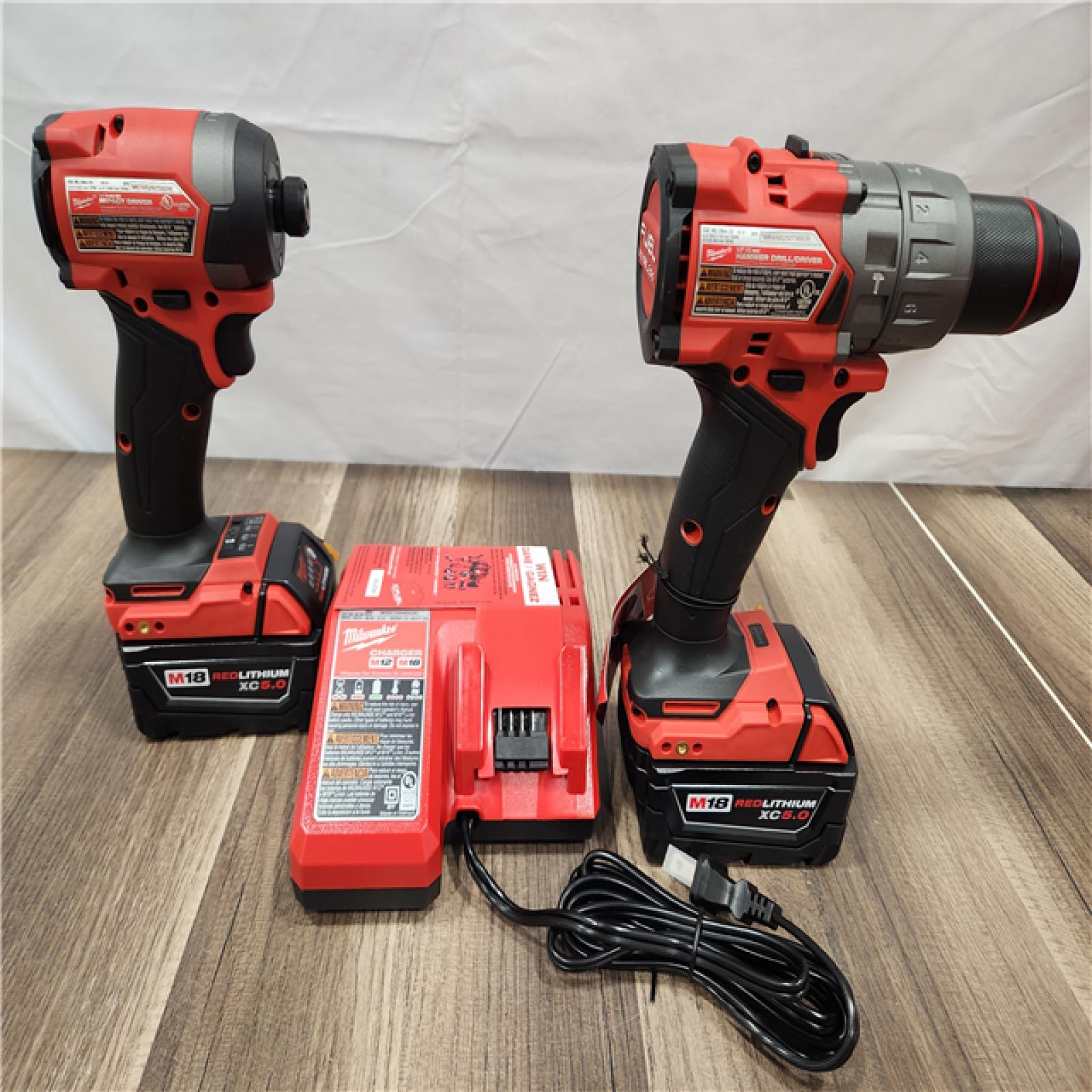 AS-IS- MILWAUKEE FUEL 18V Lithium-Ion Brushless Cordless Hammer Drill and Impact Driver Combo Kit