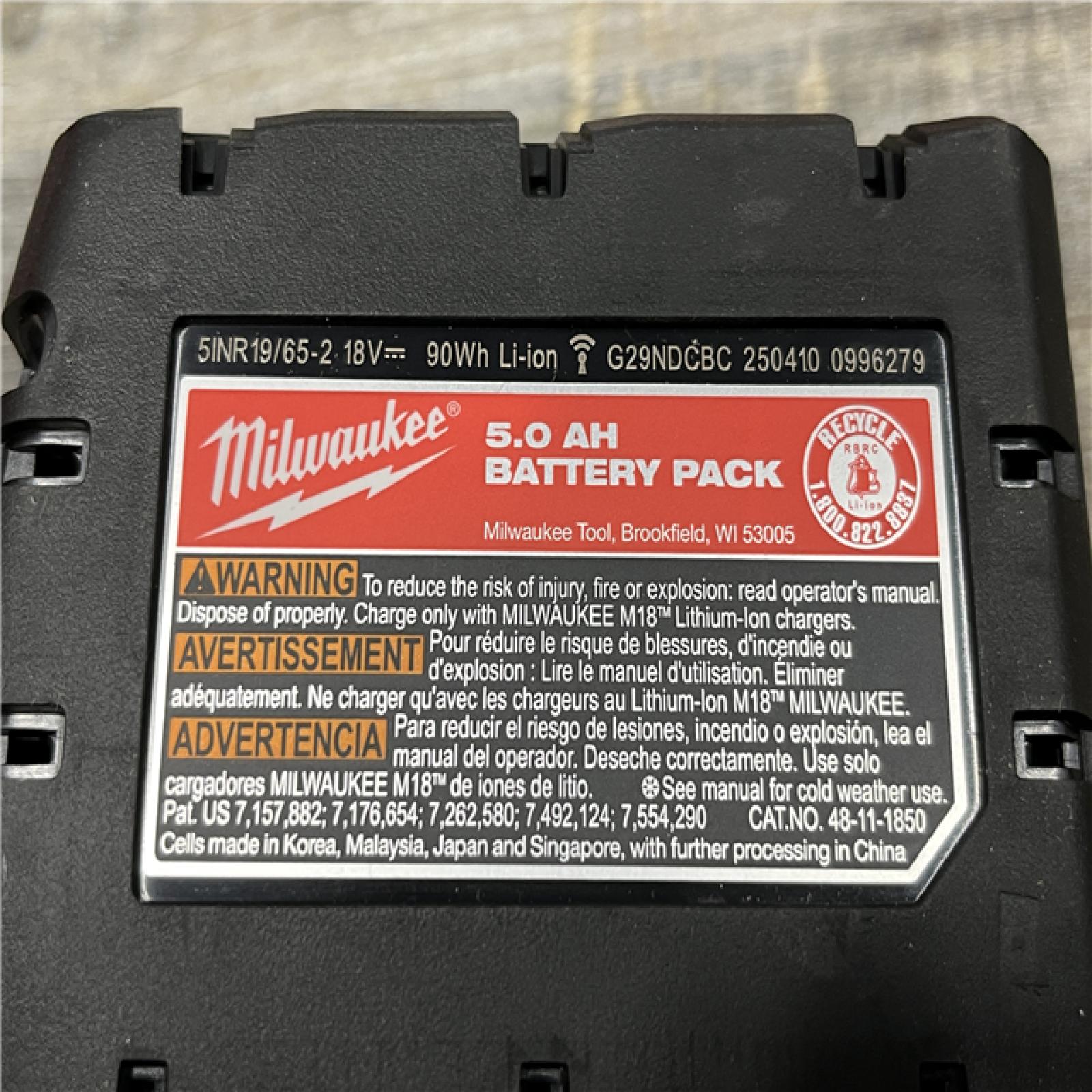 AS-IS Milwaukee 18-Volt Lithium-Ion XC Starter Kit with One 5.0Ah Battery and Charger