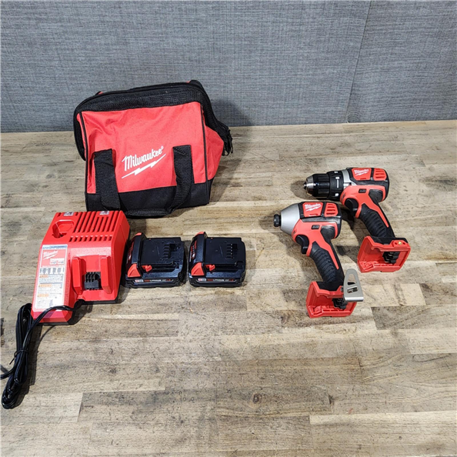 HOUSTON LOCATION - AS-IS Milwaukee M18 Brushed Cordless (2-Tool) Drill/Driver and Impact Driver Kit