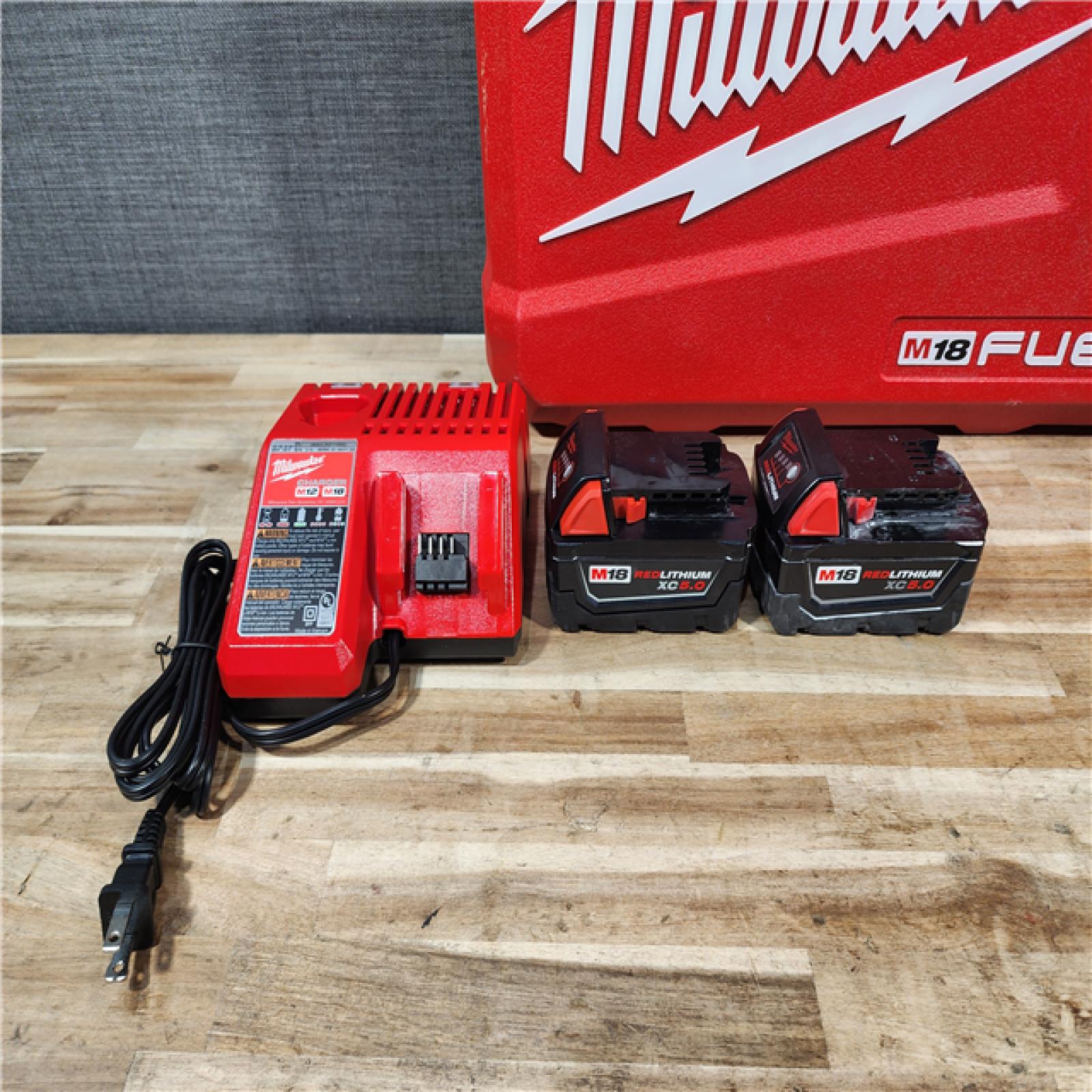 HOUSTON LOCATION - AS-IS Milwaukee  FUEL 18V Lithium-Ion Brushless Cordless Hammer Drill and Impact Driver Combo Kit
