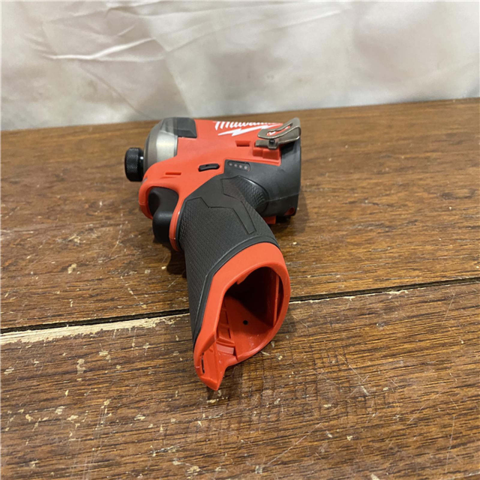 AS-IS M12 FUEL SURGE 12V Lithium-Ion Brushless Cordless 1/4 in. Hex Impact Driver Compact Kit W/Two 2.0Ah Batteries, Bag