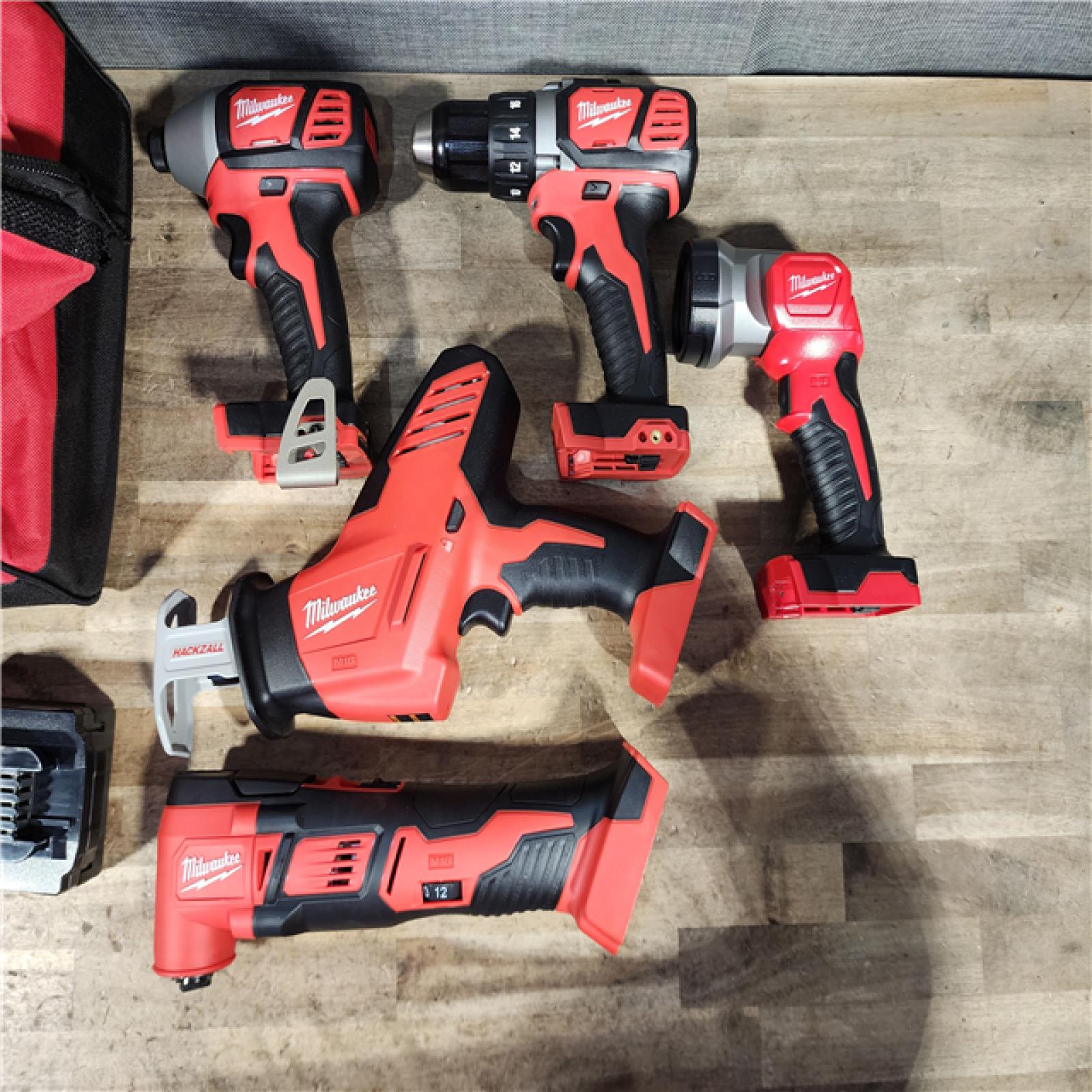 HOUSTON LOCATION - AS-IS M18 18V Lithium-Ion Cordless Combo Kit (5-Tool) with (2) Batteries  Charger and Tool Bag
