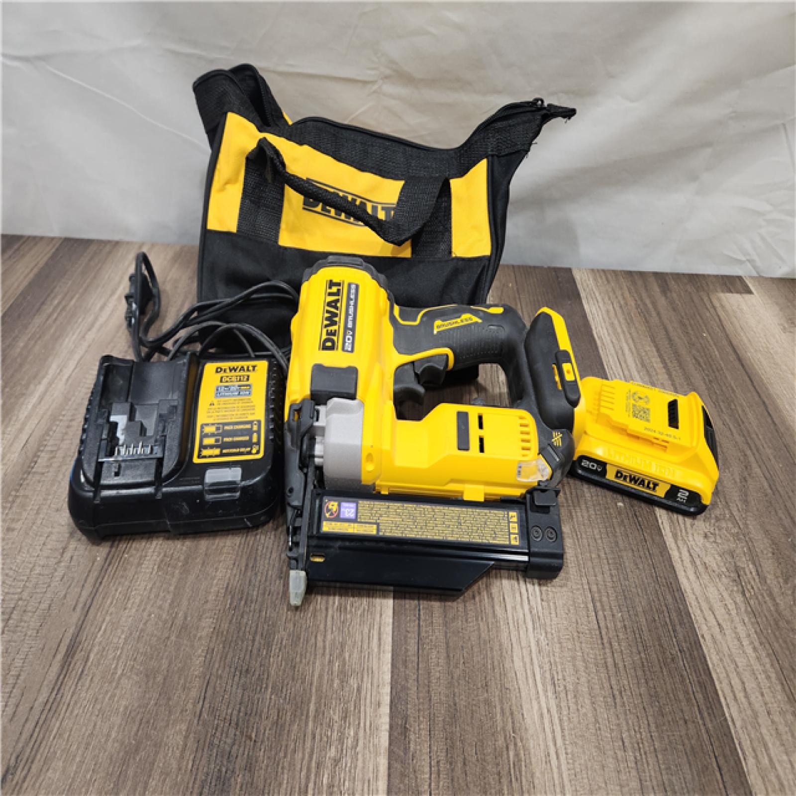 AS-IS DEWALT ATOMIC 20V MAX Lithium Ion Cordless 23 Gauge Pin Nailer Kit with 2.0Ah Battery and Charger