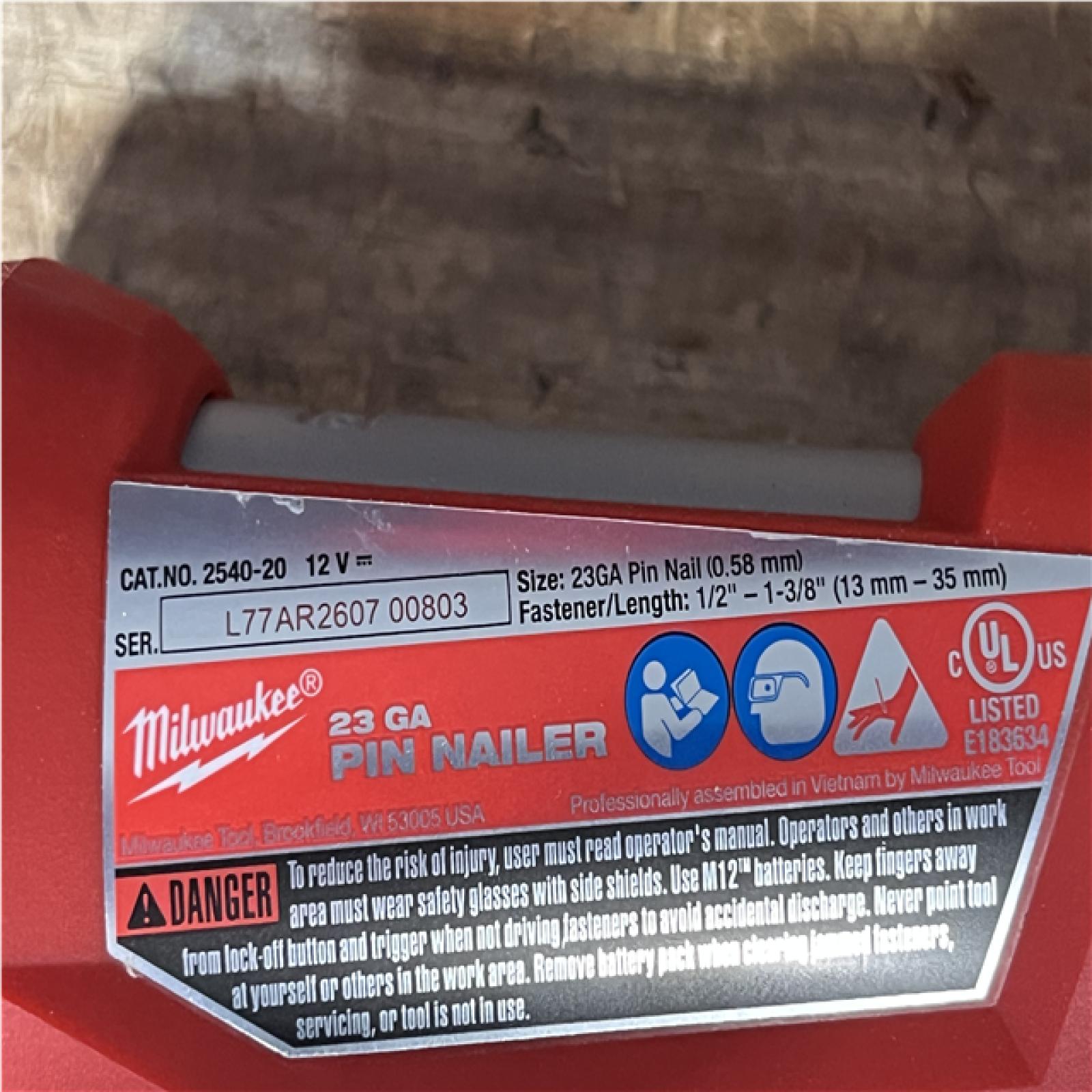Houston Locations AS-IS Milwaukee Drill Driver and Impact Driver and Pin Nailer and Batteries QTY/2 with Charger