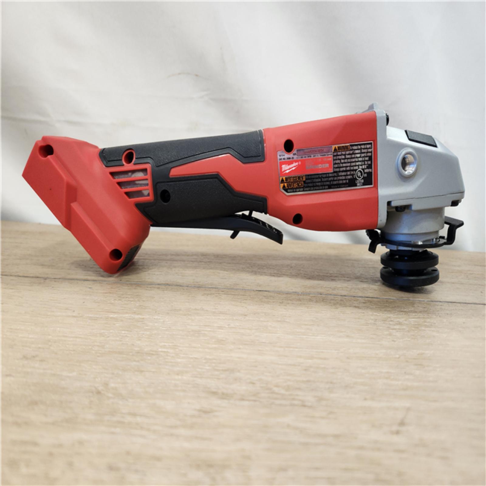 AS-IS- Milwaukee 18V Lithium-Ion Brushless Cordless 4-1/2 in./5 in. Grinder w/Paddle Switch (Tool-Only)