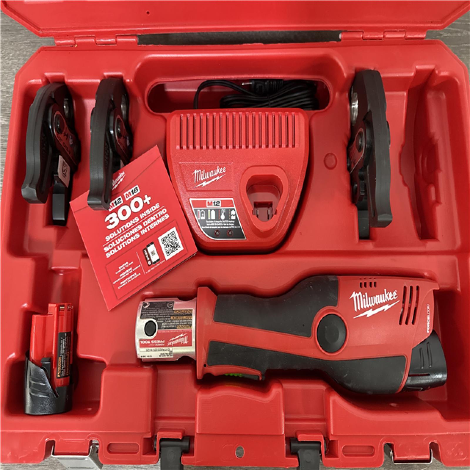 CALIFORNIA AS-IS Milwaukee M12 Force Logic Press Tool Kit  Includes (2) Batteries  Charger & Hard Case