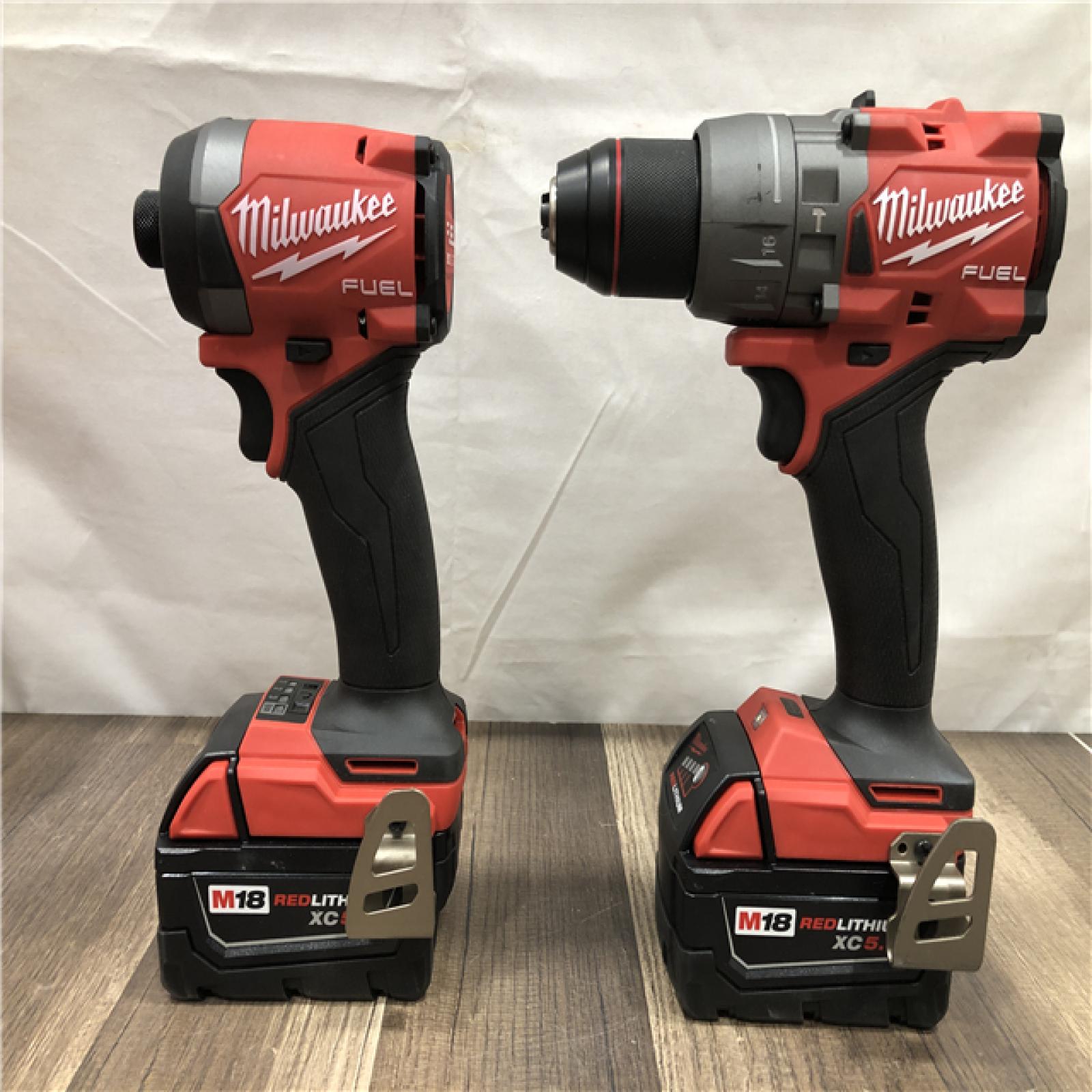 AS-IS Milwaukee FUEL 18V Lithium-Ion Brushless Cordless Hammer Drill and Impact Driver Combo Kit