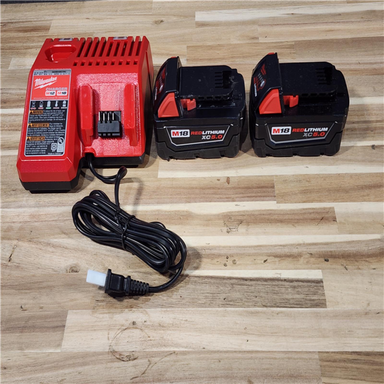HOUSTON LOCATION - AS-IS MILWAUKEE 2 TOOL COMBO KIT W/ (2) BATTERY & CHARGER