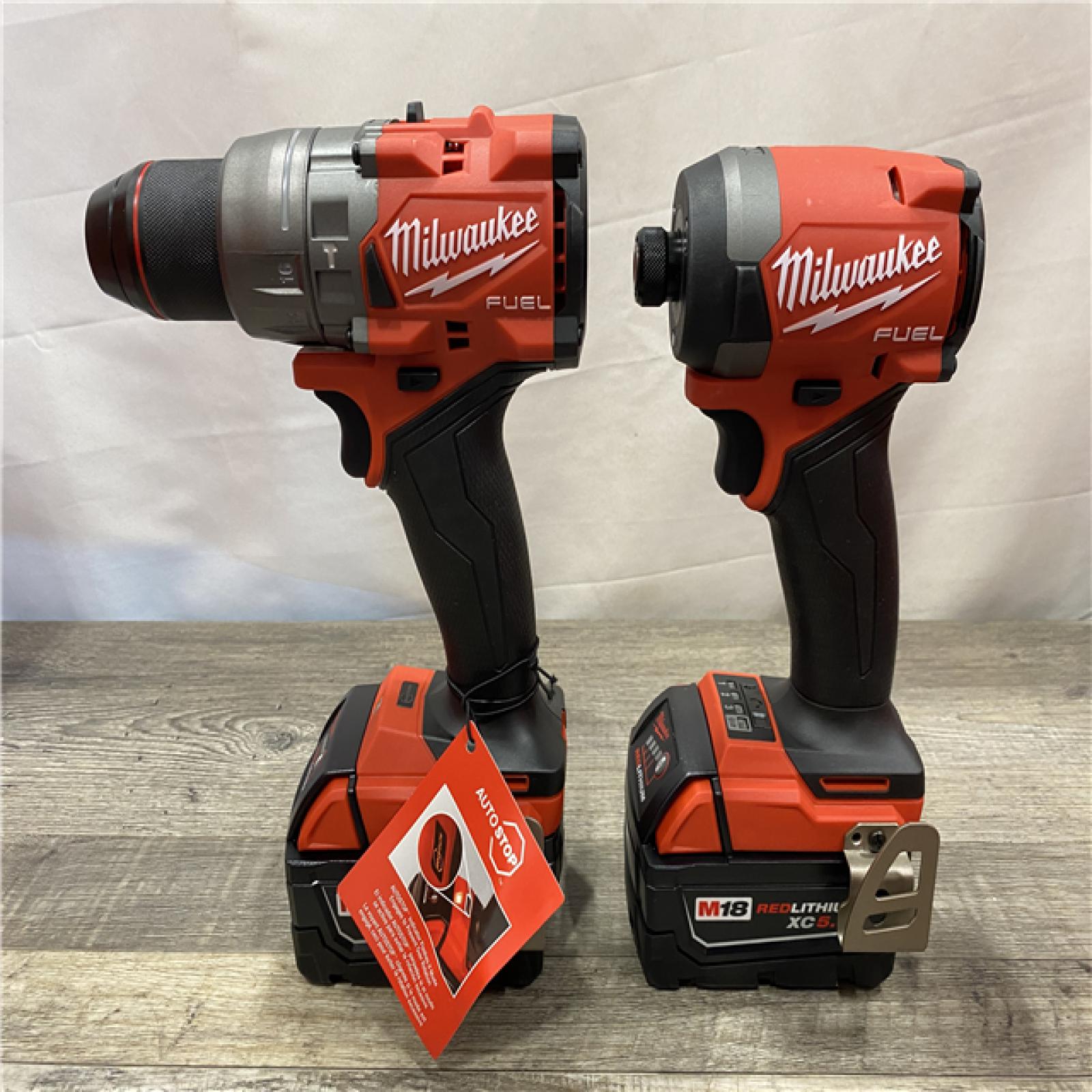 AS-IS Milwaukee  FUEL 18V Lithium-Ion Brushless Cordless Hammer Drill and Impact Driver Combo Kit