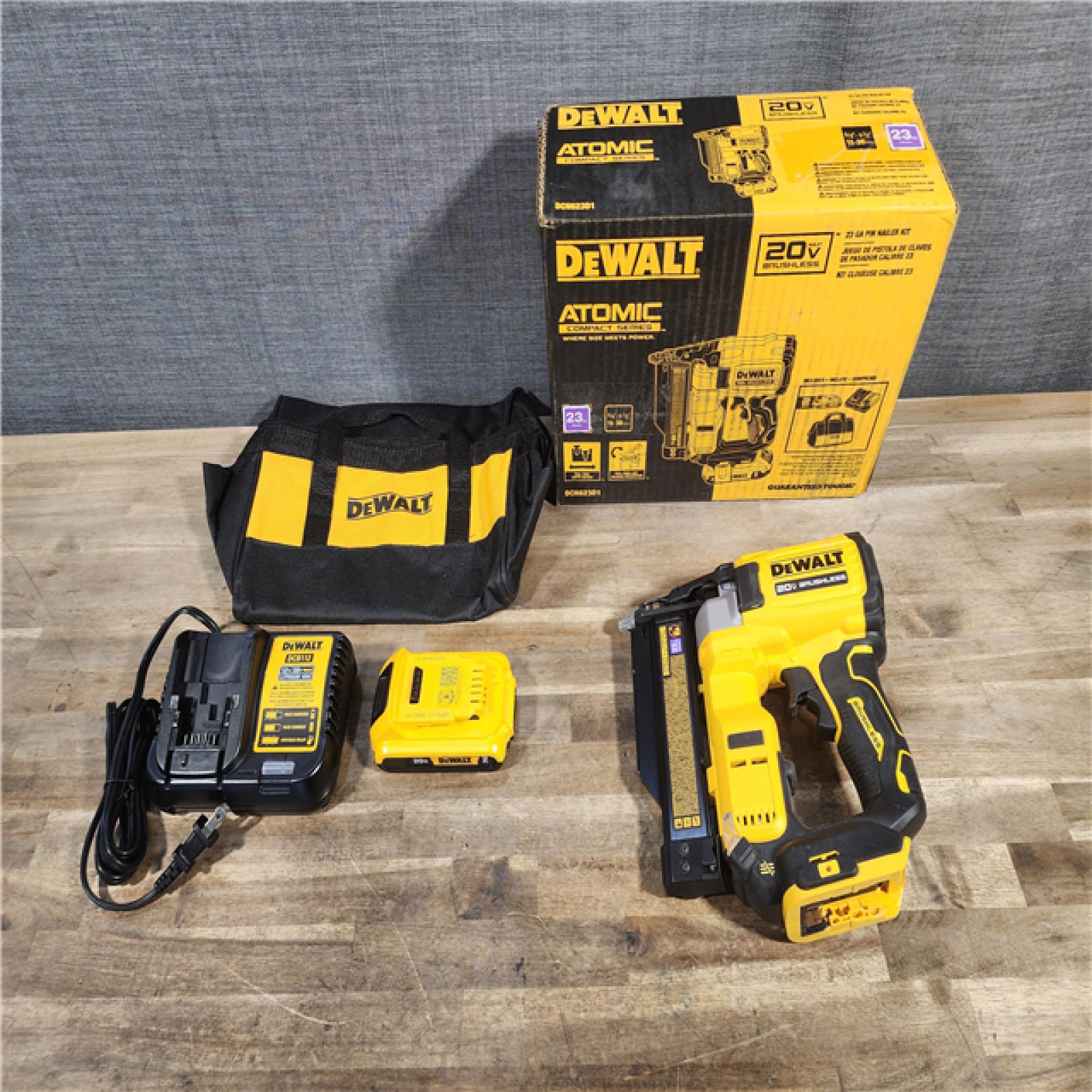 HOUSTON LOCATION - AS-IS DEWALT ATOMIC 20V MAX Lithium Ion Cordless 23 Gauge Pin Nailer Kit with 2.0Ah Battery and Charger