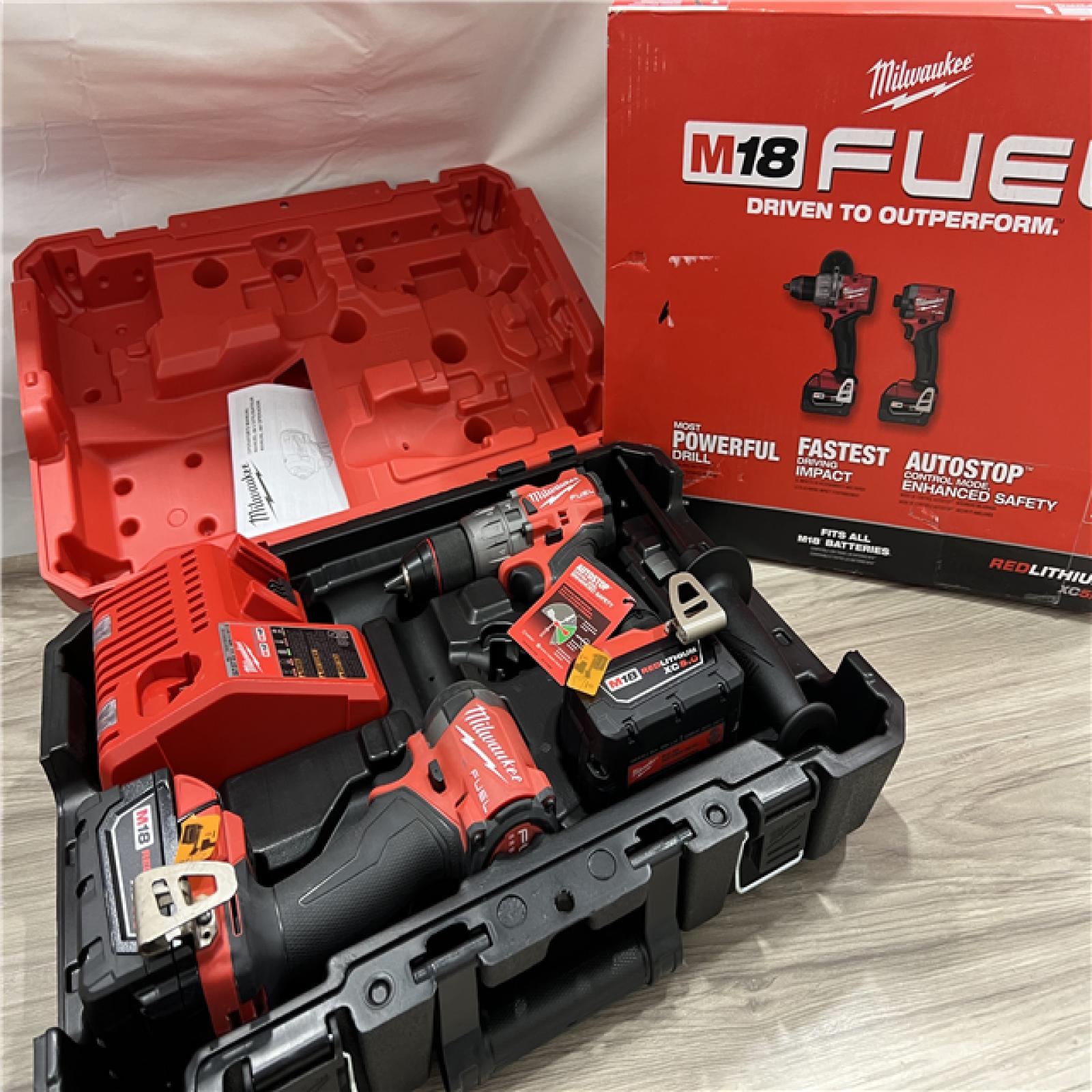 AS-IS Milwaukee FUEL 18V Lithium-Ion Brushless Cordless Hammer Drill and Impact Driver Combo Kit