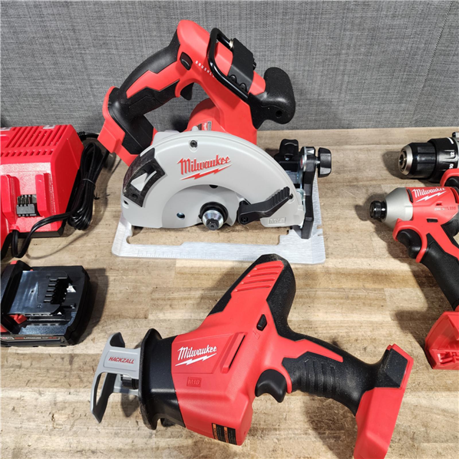 HOUSTON LOCATION - AS-IS Milwaukee M18 Cordless Brushless 4 Tool Combo Kit