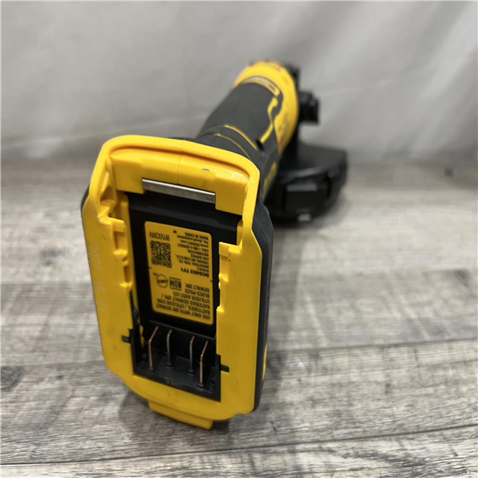 AS-IS DEWALT ATOMIC 20V MAX Cordless 4-1/2 in. Angle Grinder with Paddle Switch (Tool Only)