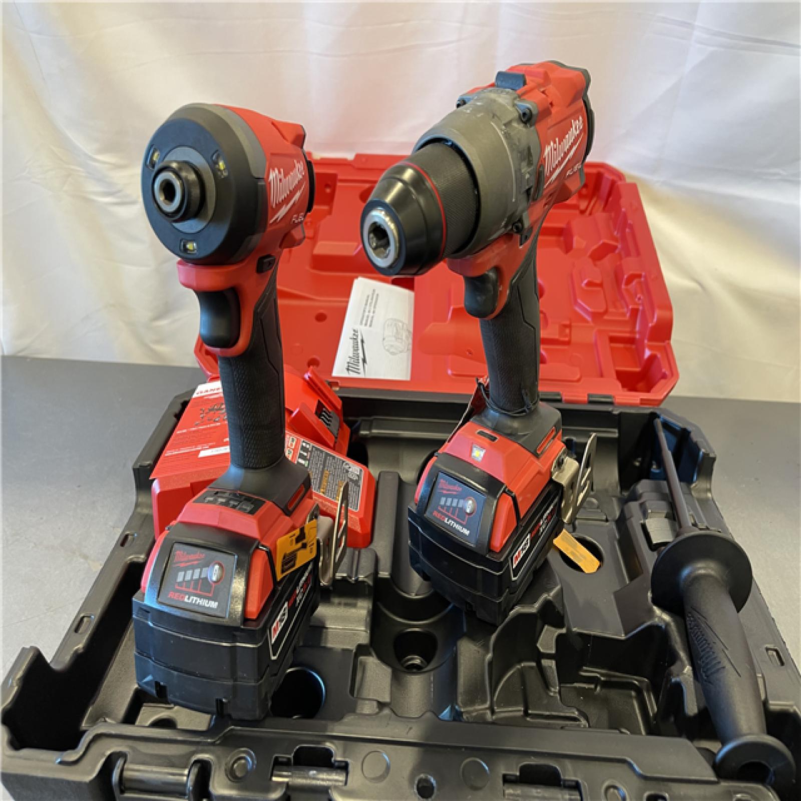 AS-IS - Milwaukee M18 FUEL 18V Lithium-Ion Brushless Cordless Hammer Drill and Impact Driver Combo Kit