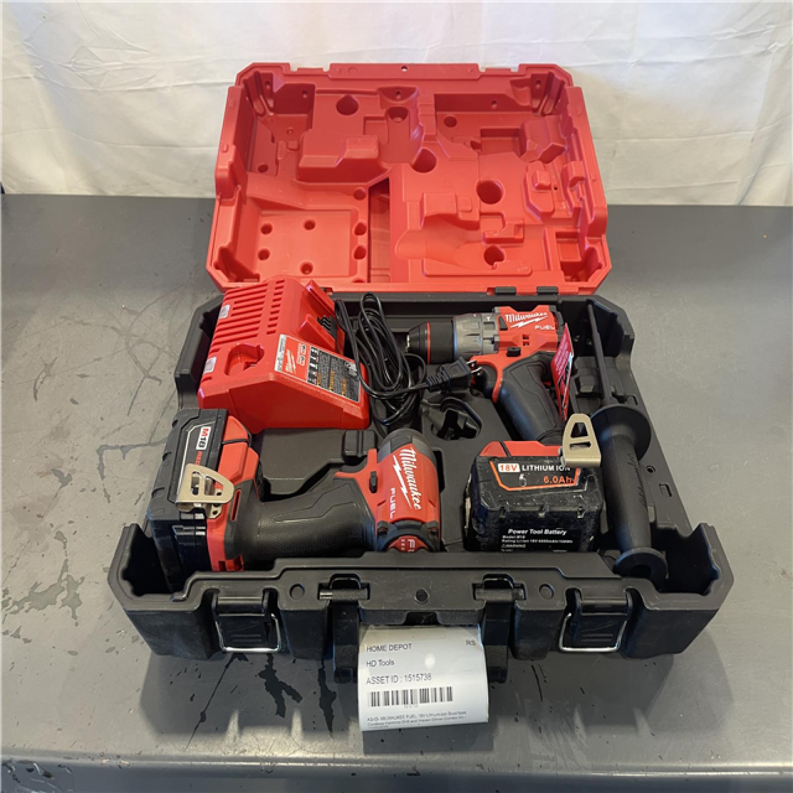 AS-IS- MILWAUKEE FUEL 18V Lithium-Ion Brushless Cordless Hammer Drill and Impact Driver Combo Kit