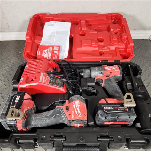 Houston location- AS-IS Milwaukee 3697-22 18V M18 Fuel Lithium-Ion Brushless Cordless 2-Tool Combo Kit with 1/2 Hammer Drill and 1/4 Hex Impact Driver