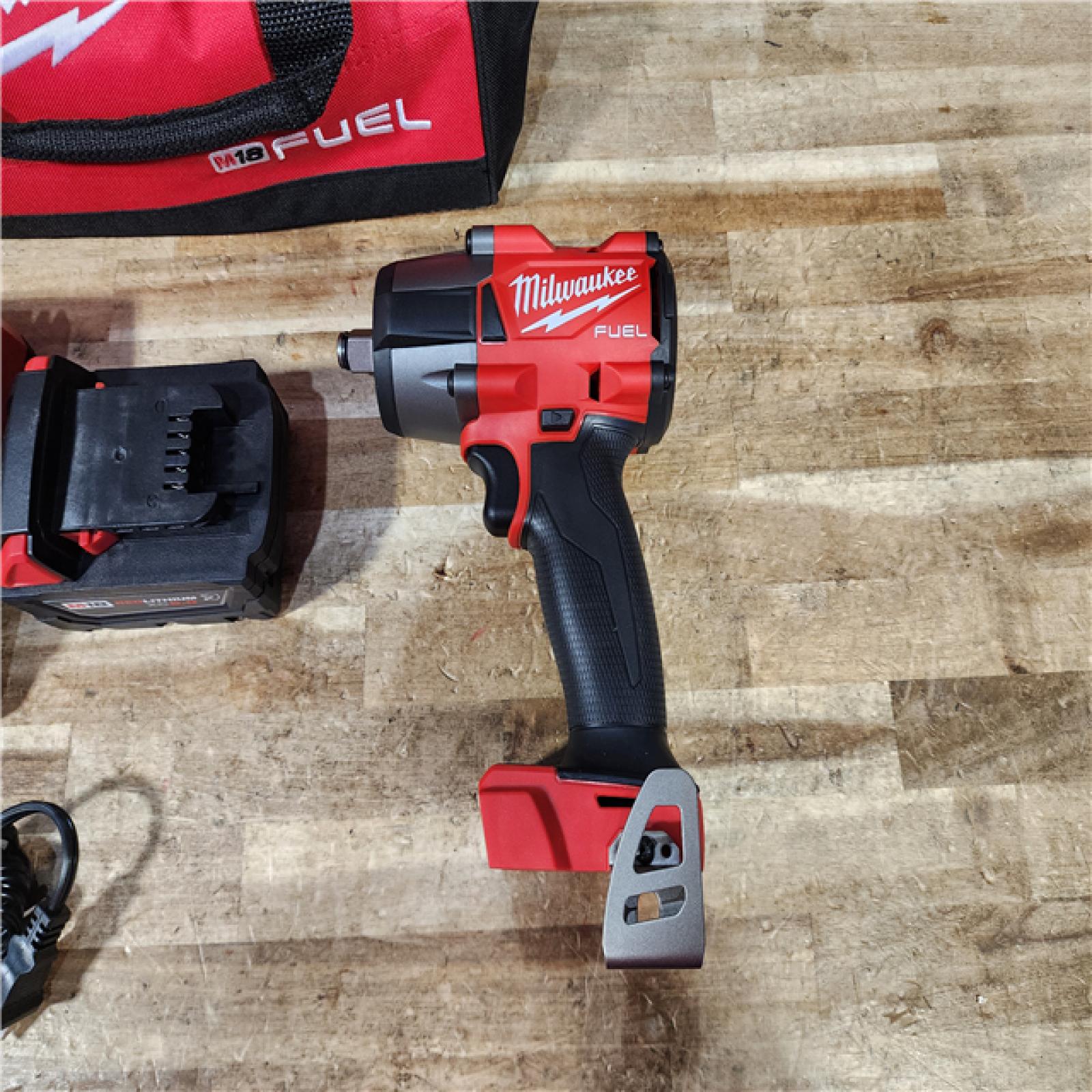 HOUSTON LOCATION - AS - IS Milwaukee FUEL Gen-2 18V Lithium-Ion Brushless Cordless Mid Torque 1/2 in. Impact Wrench w/Friction Ring COMBO KIT