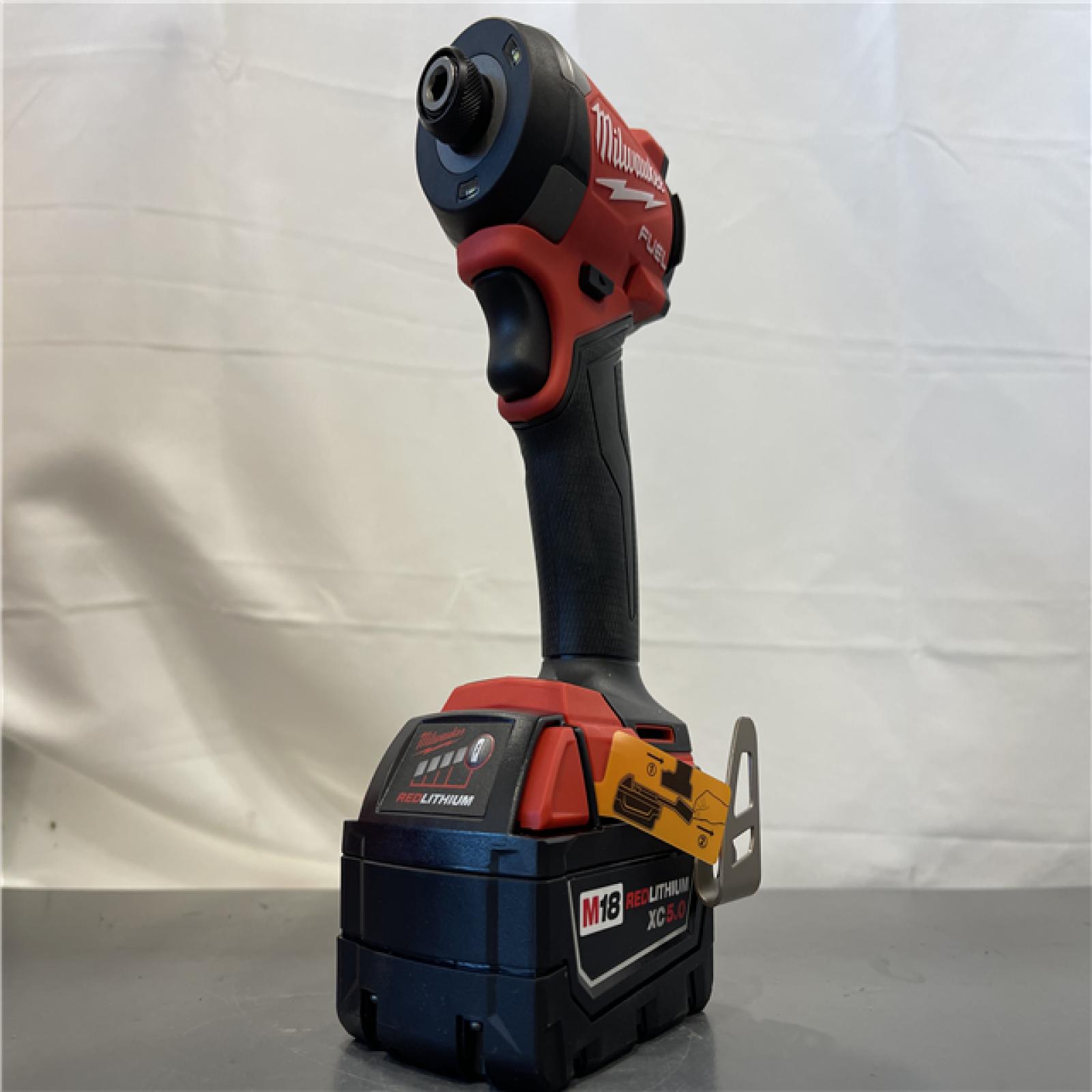 AS-IS - MILWAUKEE FUEL 18V Lithium-Ion Impact Driver with M18 REDLITHIUM XC5.0 battery