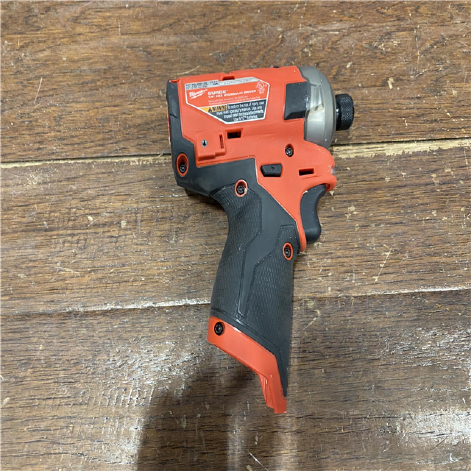AS-IS M12 FUEL SURGE 12V Lithium-Ion Brushless Cordless 1/4 in. Hex Impact Driver Compact Kit W/Two 2.0Ah Batteries, Bag