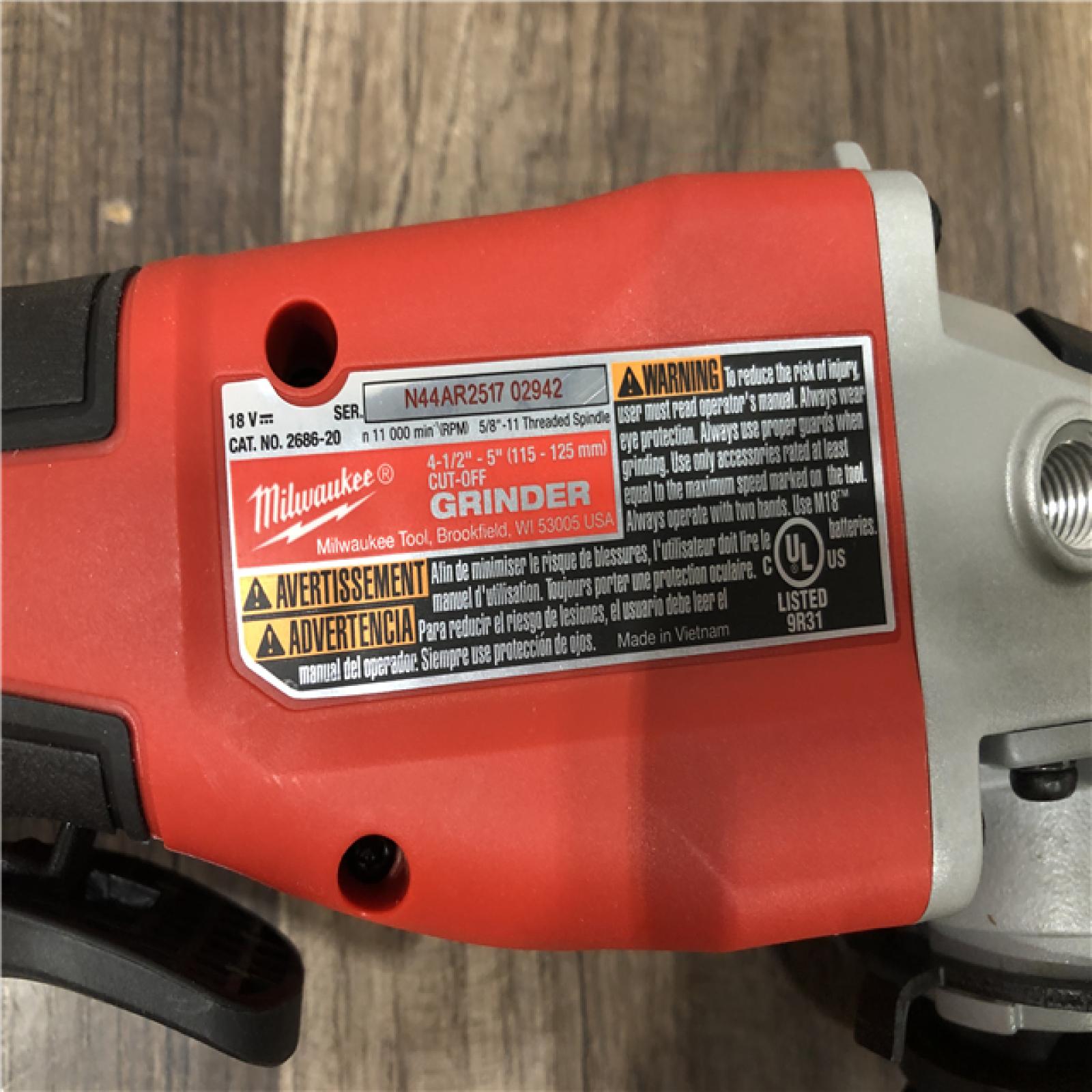 AS-IS Milwaukee 18V Lithium-Ion Brushless Cordless 4-1/2 in./5 in. Grinder w/Paddle Switch (Tool-Only)