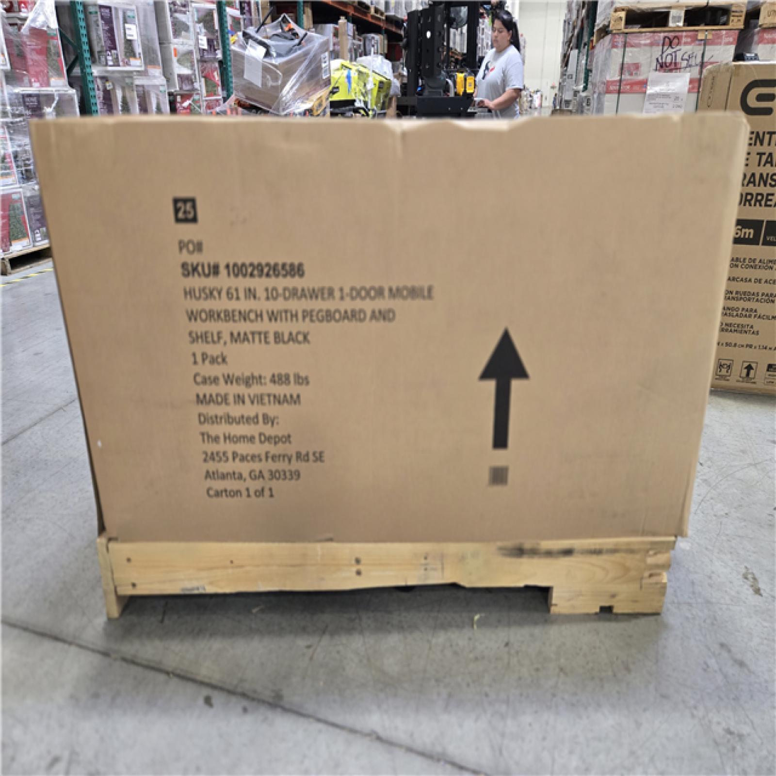 DALLAS LOCATION - AS-IS Husky 61 in. W x 26 in. D Heavy Duty 10-Drawer 1-Door Mobile Workbench with Hardwood Top  Pegboard and Shelf in Matte Black