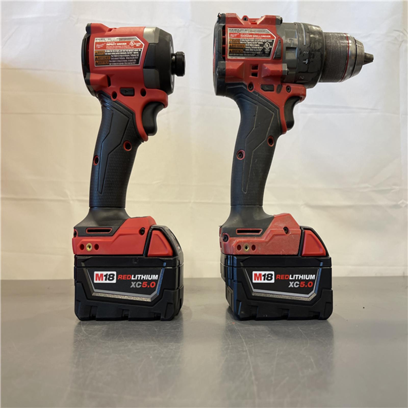 AS-IS - MILWAUKEE FUEL 18V Lithium-Ion Brushless Cordless Hammer Drill and Impact Driver Combo Kit