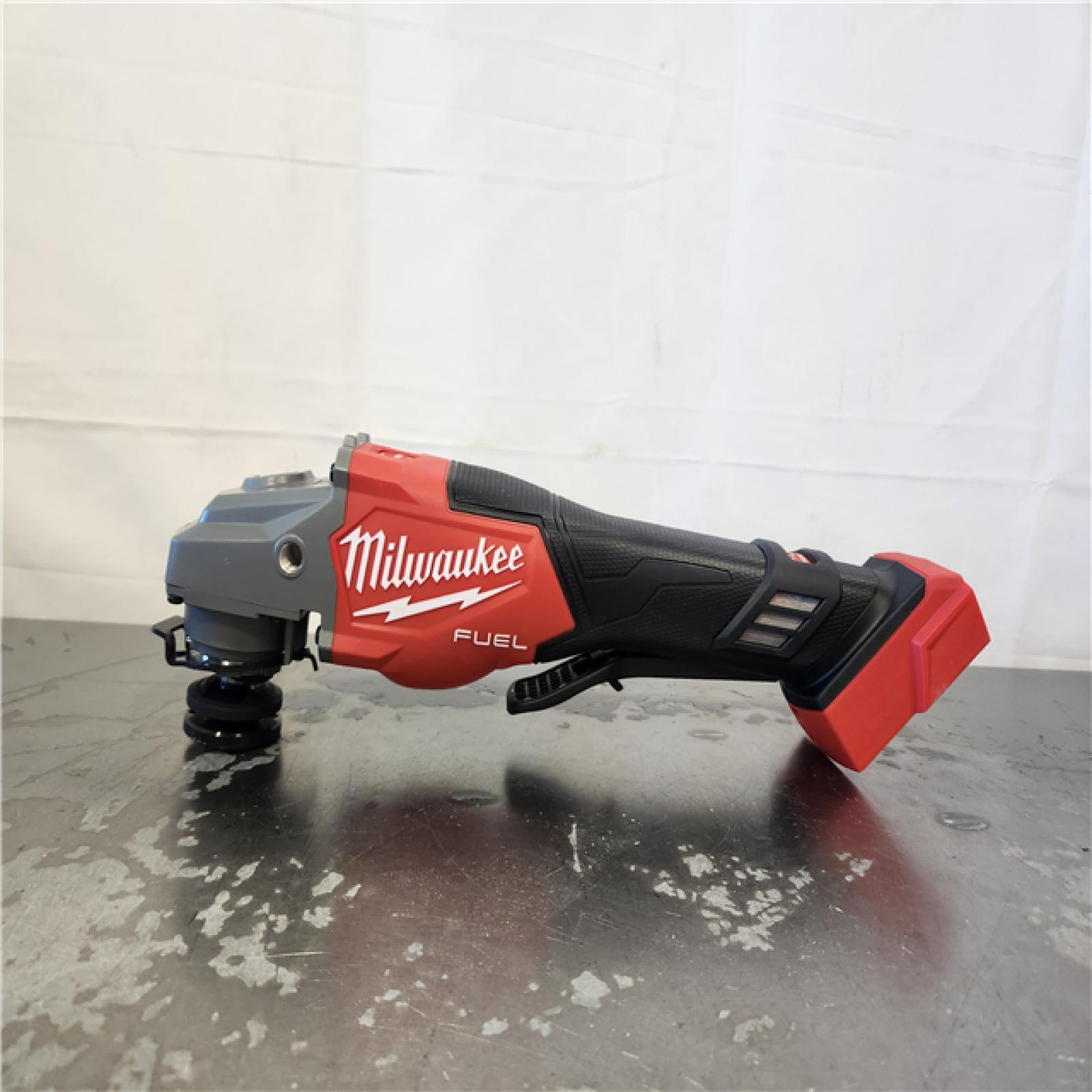 AS-IS- Milwaukee FUEL 18-Volt Lithium-Ion Brushless Cordless 4-1/2 in./6 in. Braking Grinder with Paddle Switch (Tool-Only)