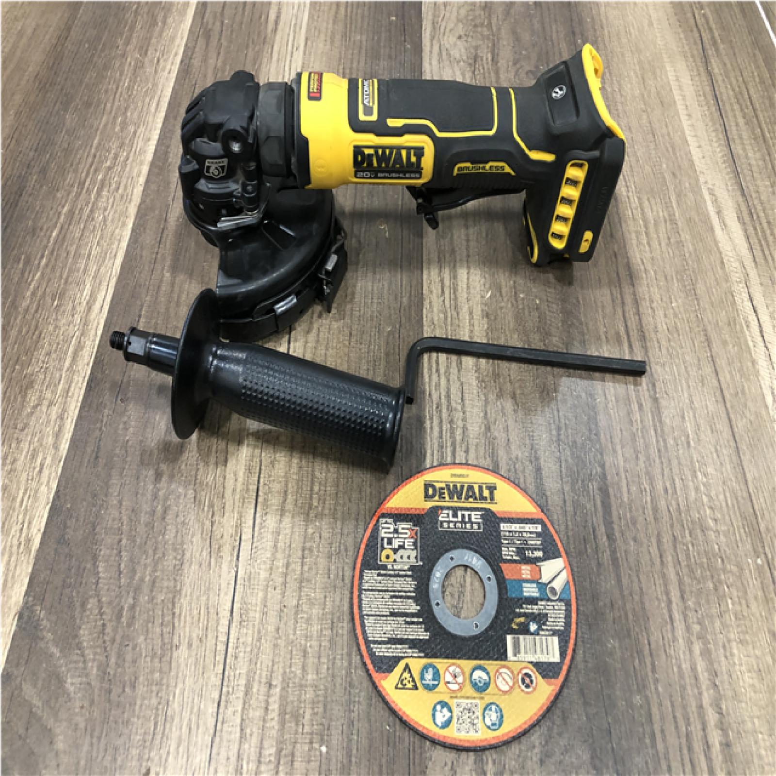 AS-IS DEWALT ATOMIC 20V MAX Cordless 4-1/2 in. Angle Grinder with Paddle Switch (Tool Only)