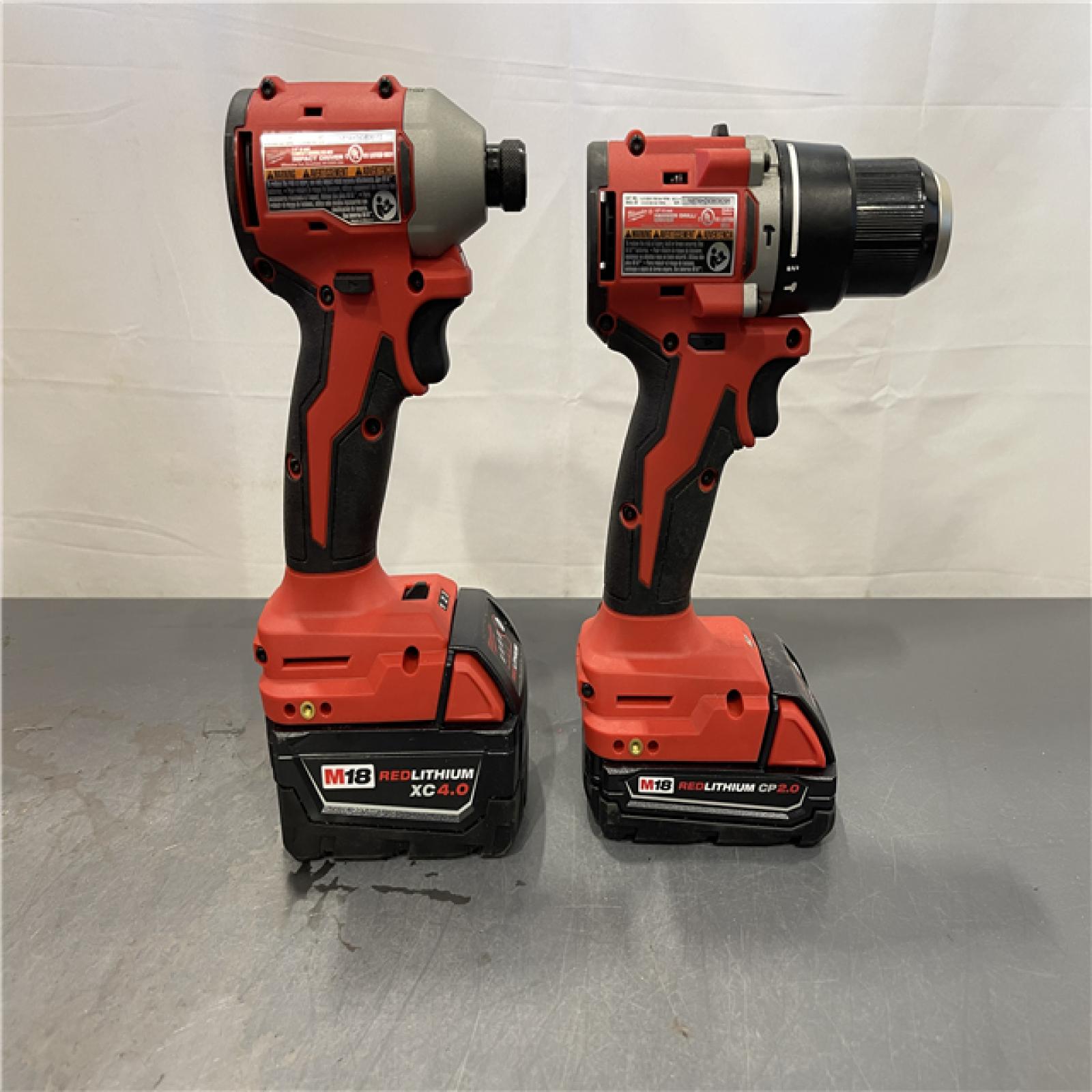 AS-IS - Milwaukee M18 18-Volt Lithium-Ion Brushless Cordless Compact Hammer Drill/Impact Combo Kit