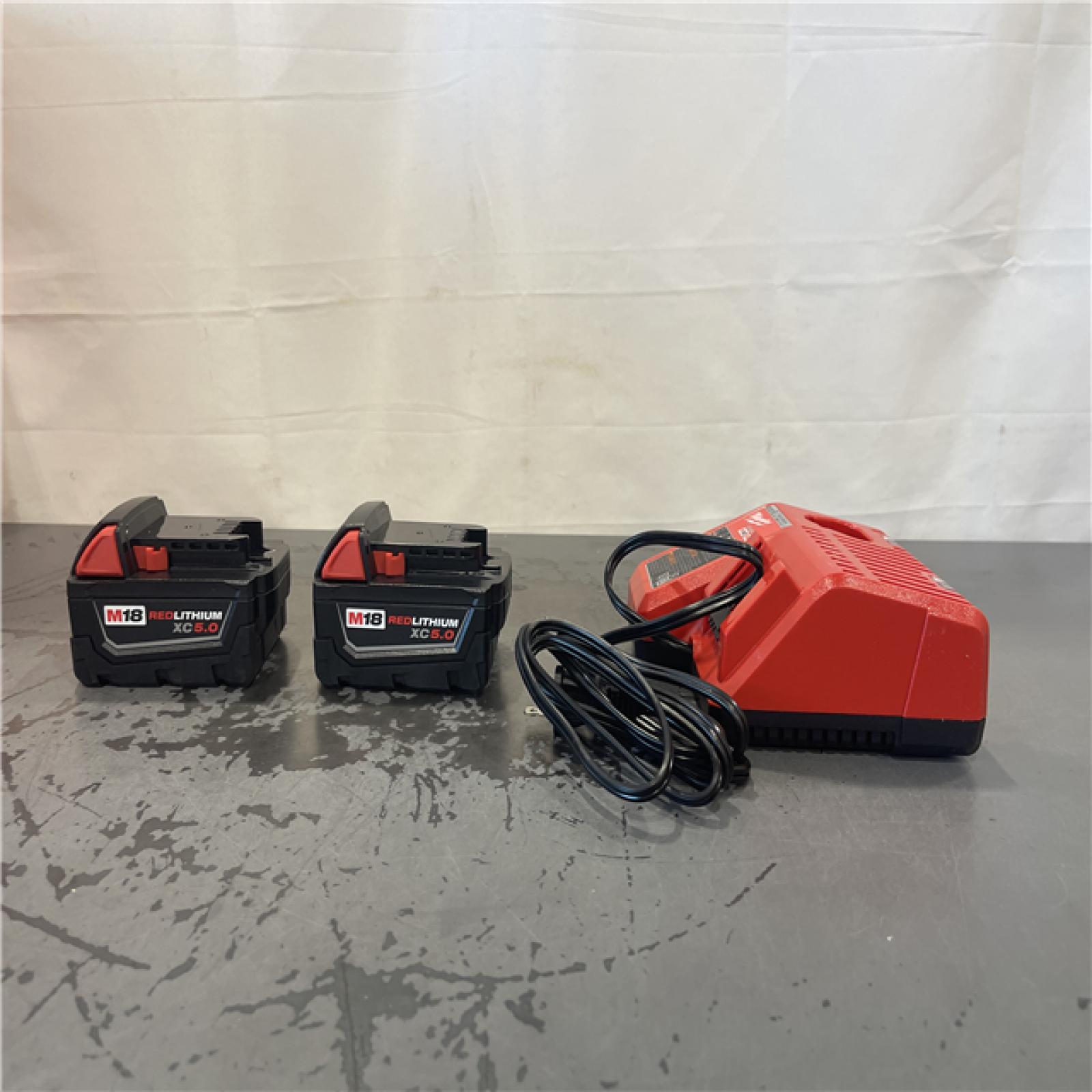 AS-IS- M18 18-Volt Lithium-Ion XC Starter Kit with Two 5.0Ah Batteries and Charger
