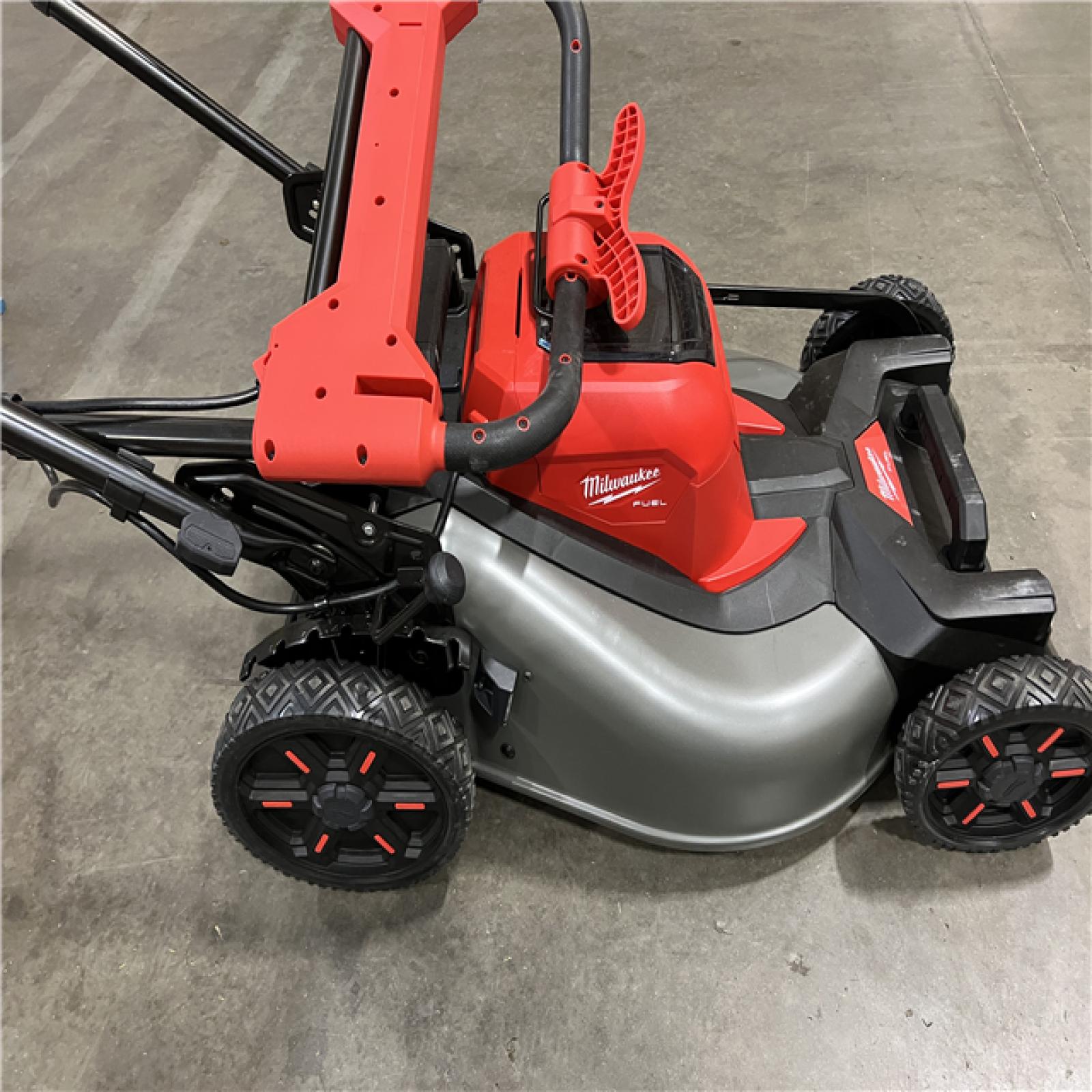 Dallas Location - As-Is Milwaukee M18 FUEL  21 in. Dual Battery Mower w/(2) 12.0Ah Battery and Rapid Charger