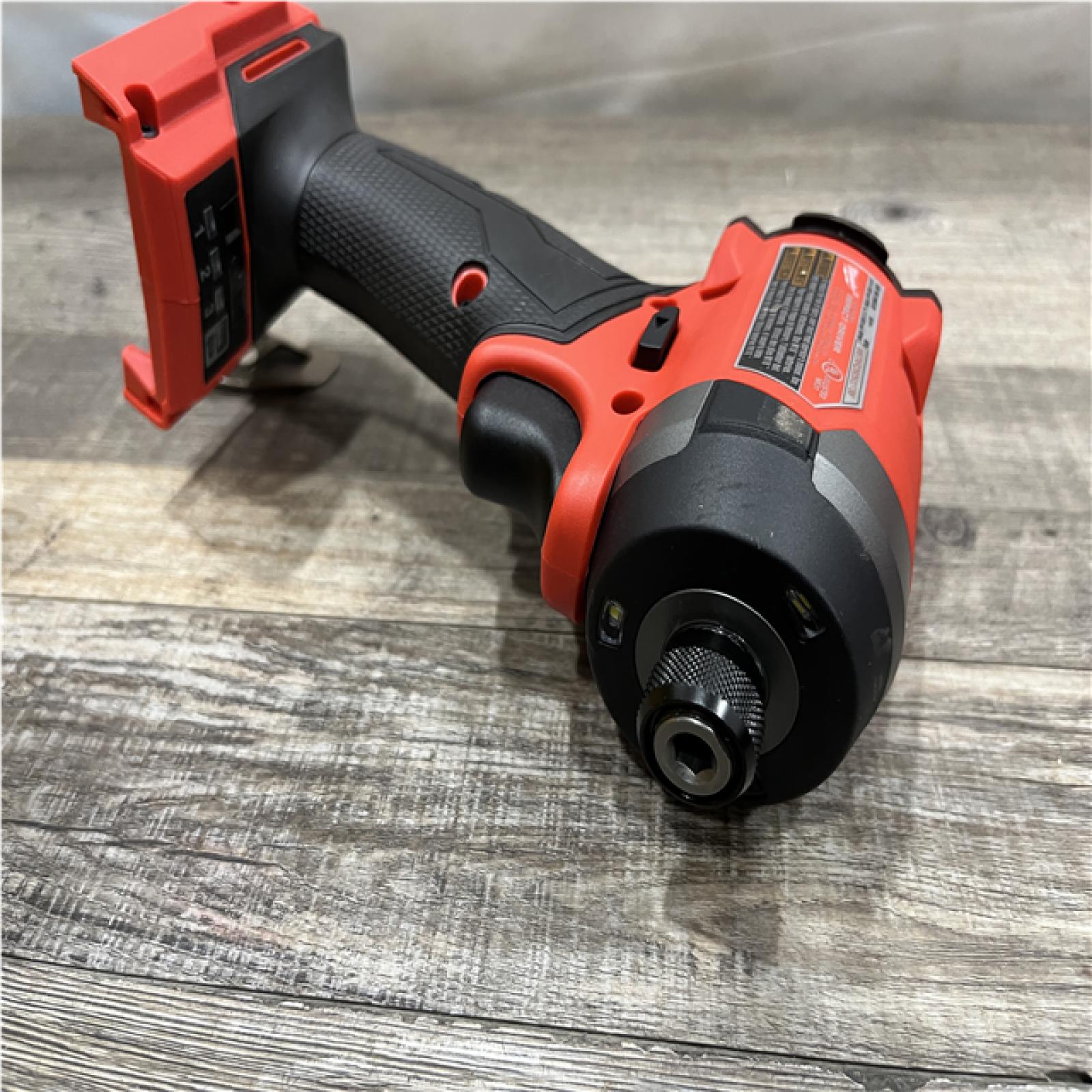 AS-IS Milwaukee FUEL 18V Lithium-Ion Brushless Cordless 1/4 in. Hex Impact Driver Kit