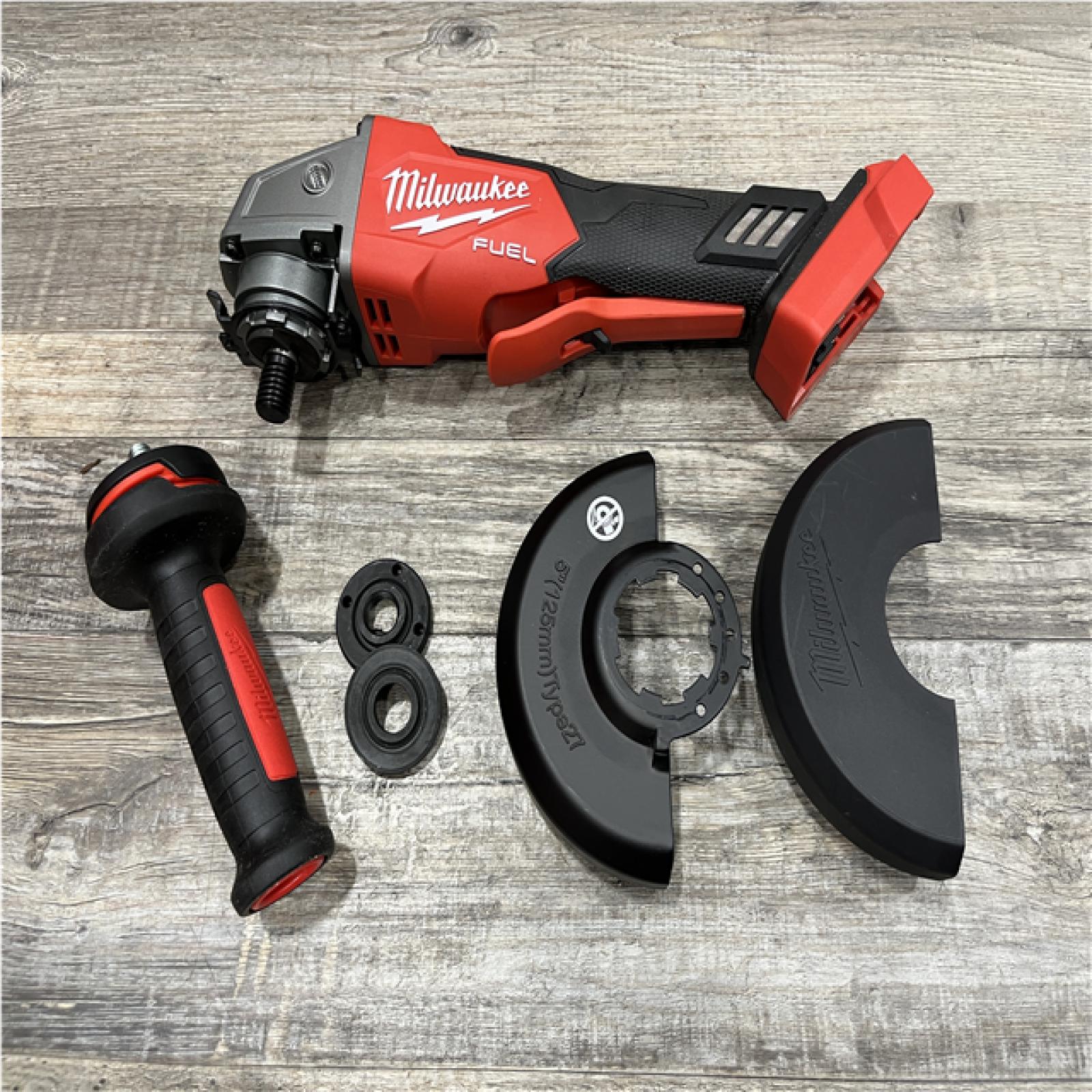 AS-IS Milwaukee FUEL 18V Lithium-Ion Brushless Cordless 4-1/2 in./5 in. Grinder w/Paddle Switch (Tool-Only)