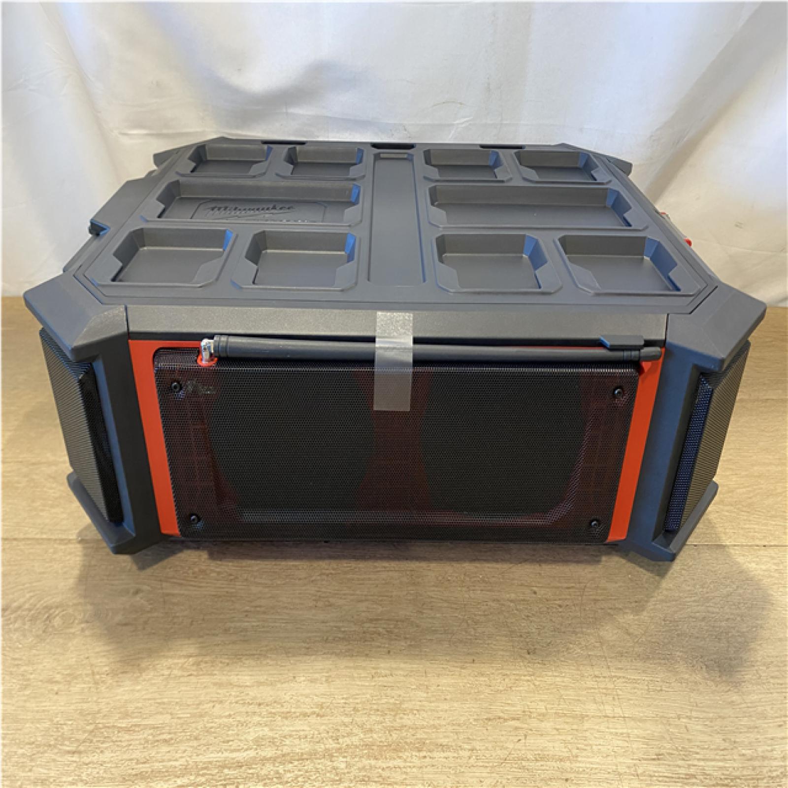 AS-IS Milwaukee Lithium-Ion Cordless PACKOUT Radio/Speaker with Built-In Charger