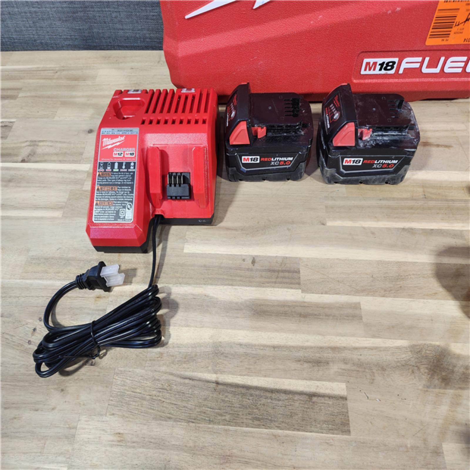 HOUSTON LOCATION - AS-IS MILWAUKEE M18 FUEL 18V Lithium-Ion Brushless Cordless Hammer Drill and Impact Driver Combo Kit (2-Tool) with 2 Batteries