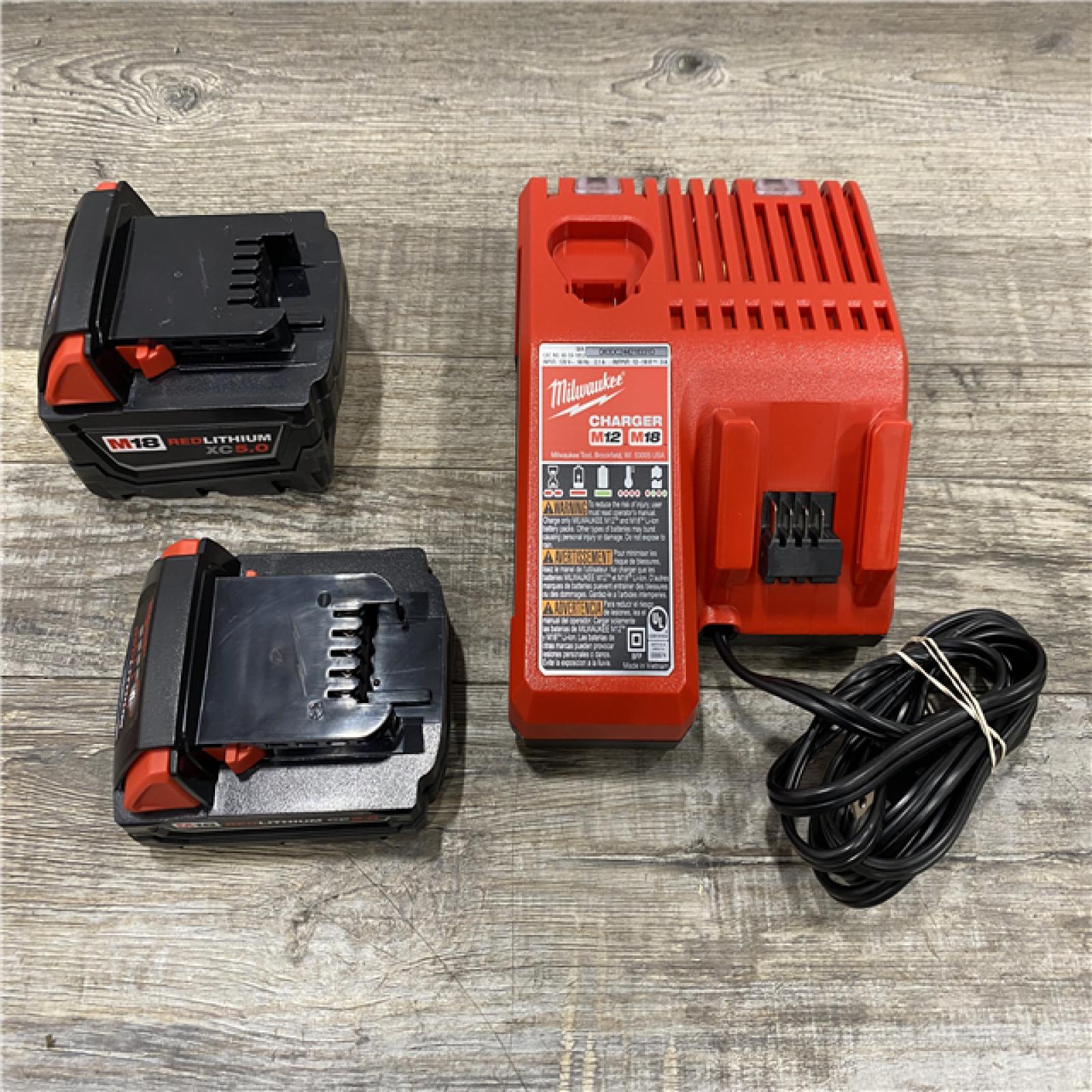 AS-IS Milwaukee 18-Volt Lithium-Ion Starter Kit with One 5.0 Ah and One 2.0 Ah Battery and Charger