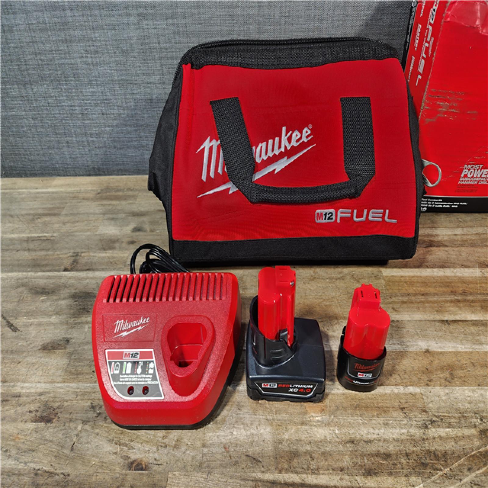 HOUSTON LOCATION - AS-IS Milwaukee FUEL 12-Volt Lithium-Ion Brushless Cordless Hammer Drill and Impact Driver Combo Kit