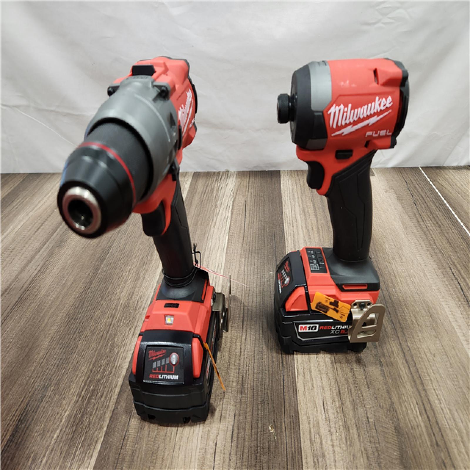 AS-IS Milwaukee M18 FUEL 18V Lithium-Ion Brushless Cordless Hammer Drill and Impact Driver Combo Kit (2-Tool) with 2 Batteries