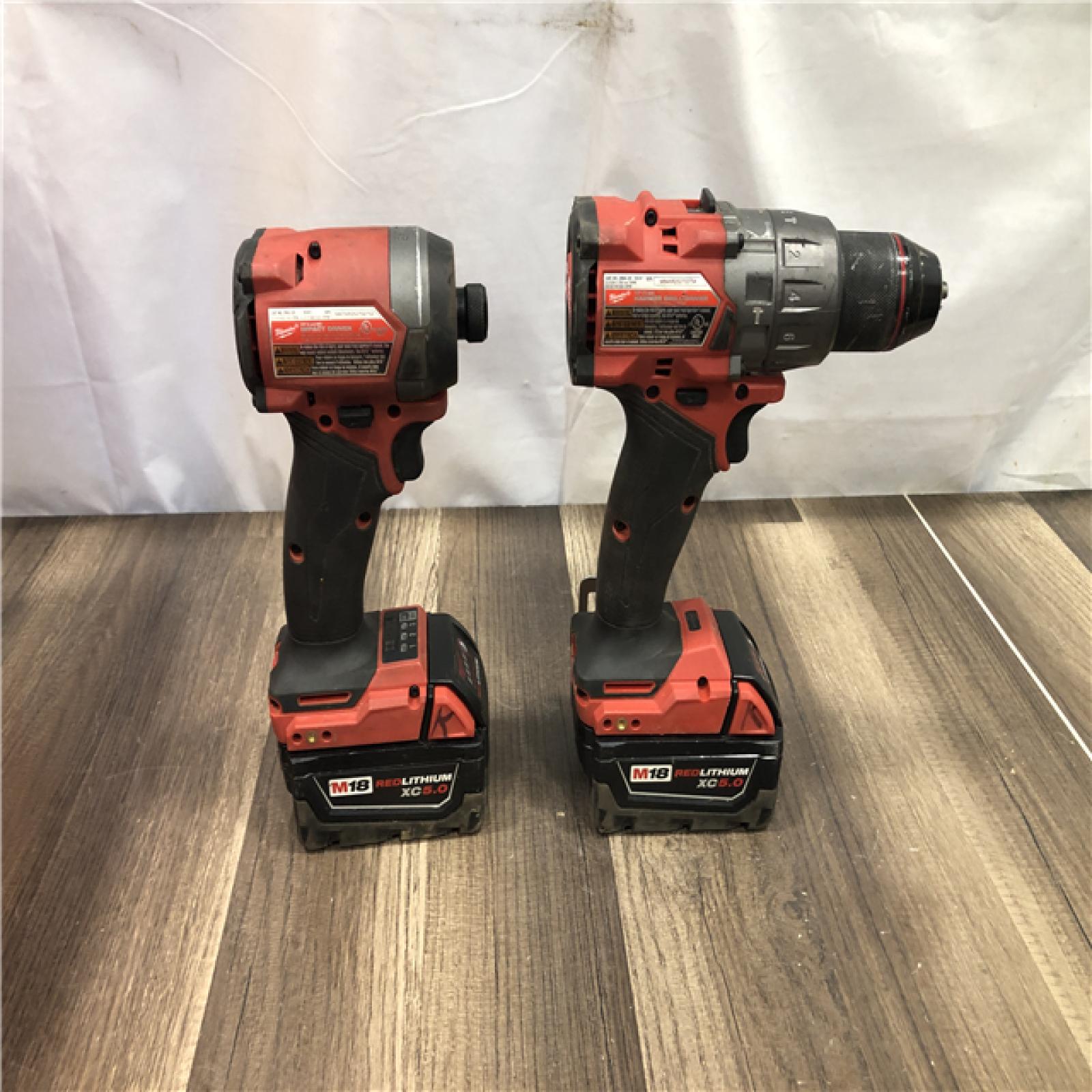 AS-IS Milwaukee  FUEL 18V Lithium-Ion Brushless Cordless Hammer Drill and Impact Driver Combo Kit