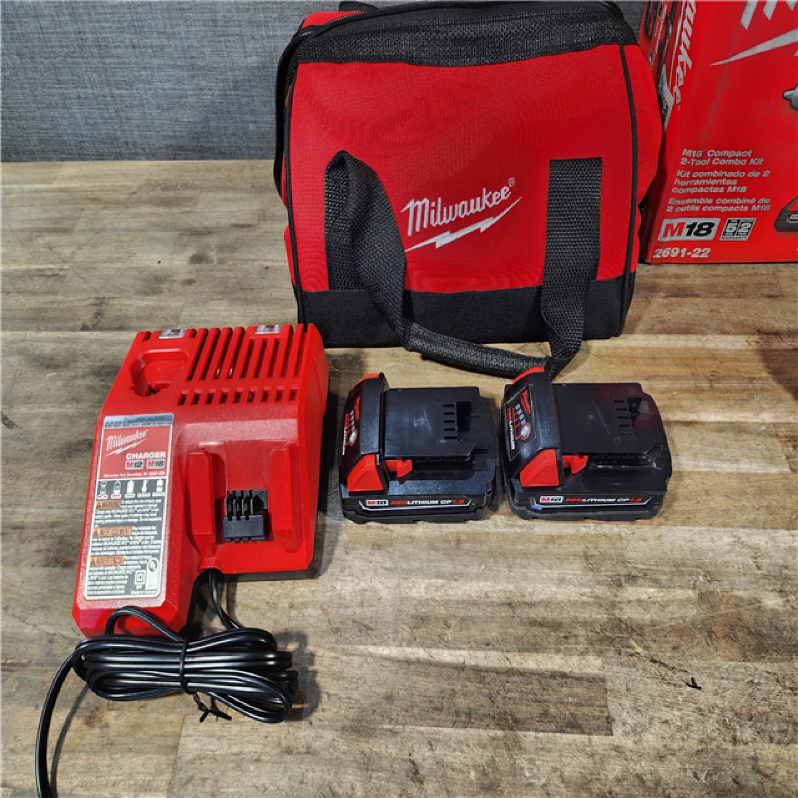HOUSTON LOCATION - AS-IS Milwaukee 18V Cordless Brushed 2-Tool Drill/Driver and Impact Driver Kit