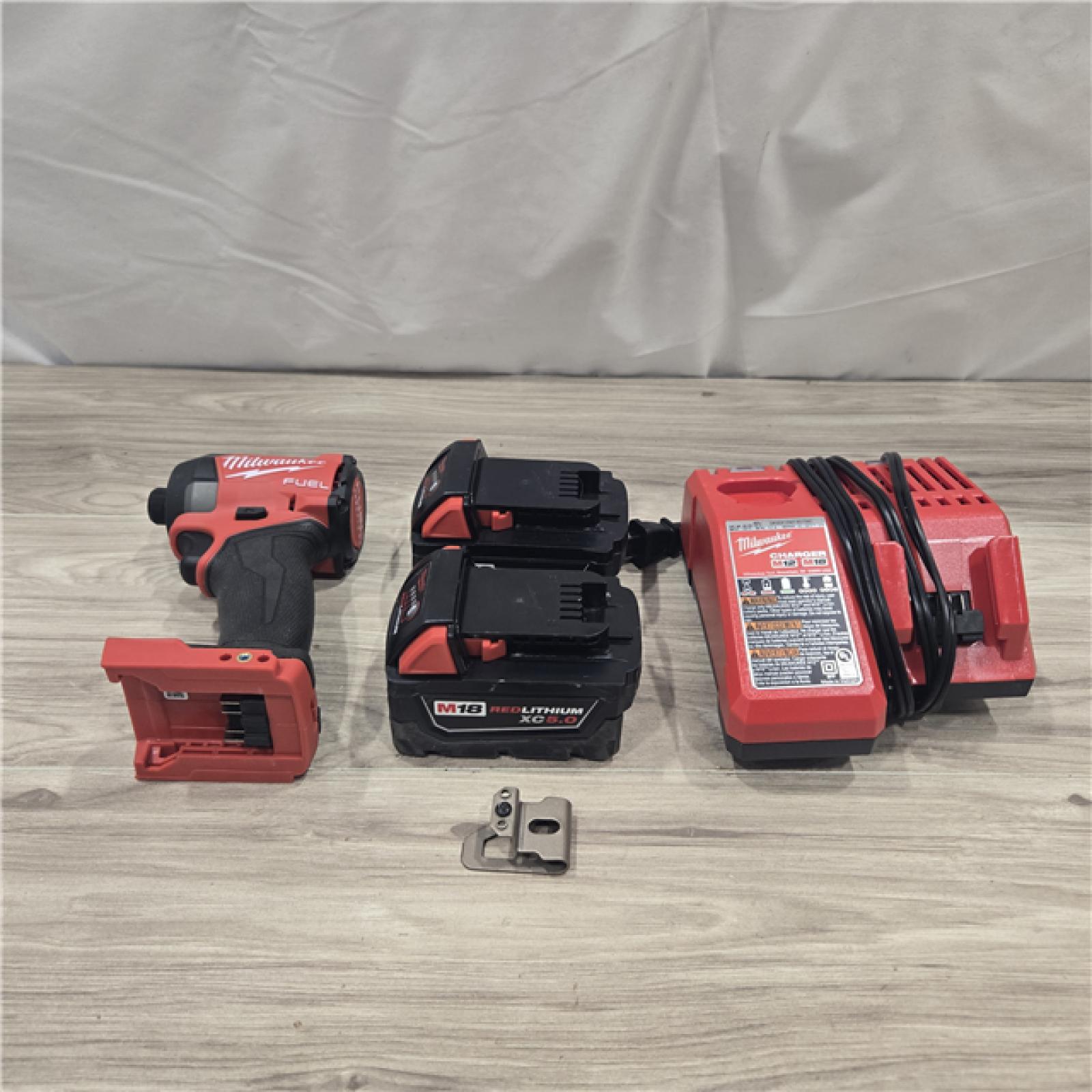 AS-IS Milwaukee 2953-22 M18 FUEL 1/4 Hex Impact Driver Kit