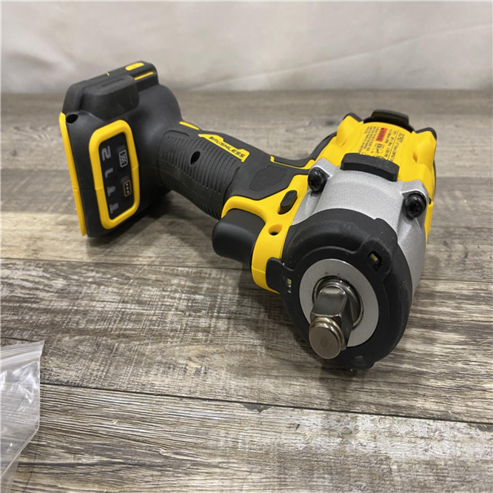 AS-IS DEWALT ATOMIC 20V MAX Cordless Brushless 1/2 in. Variable Speed Impact Wrench (Tool Only)