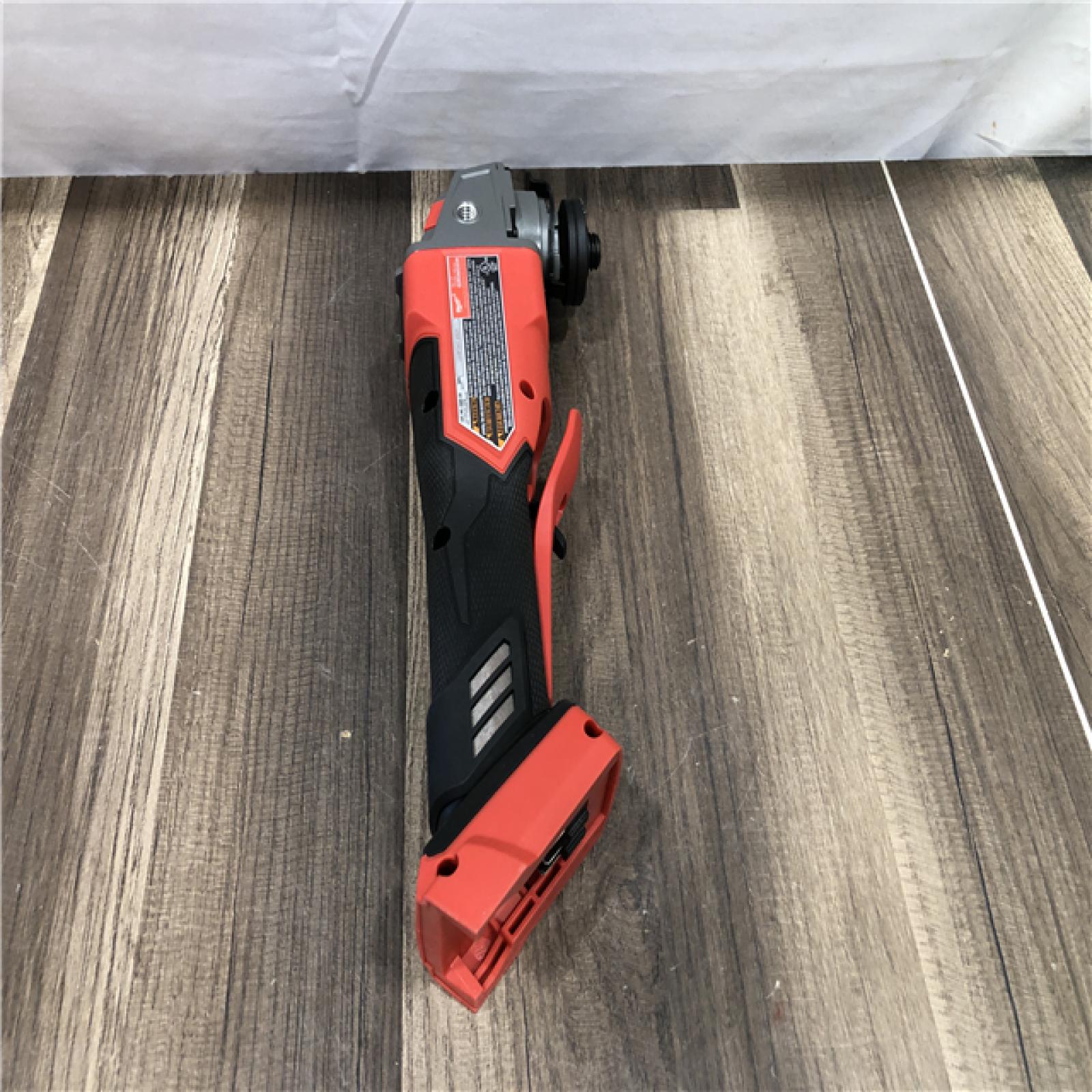 AS-IS Milwaukee  FUEL 18V Lithium-Ion Brushless Cordless 4-1/2 in./5 in. Grinder w/Paddle Switch (Tool-Only)
