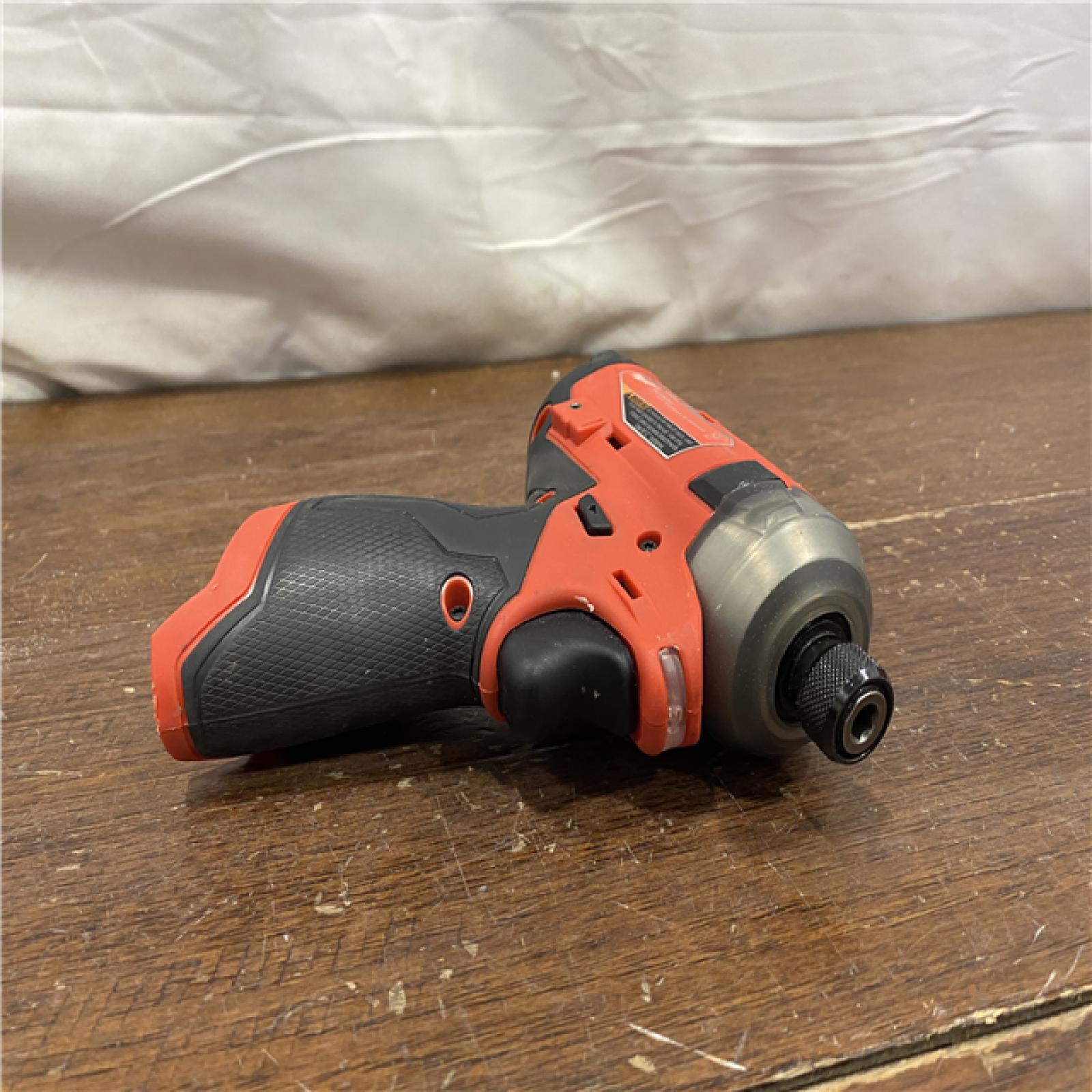 AS-IS M12 FUEL SURGE 12V Lithium-Ion Brushless Cordless 1/4 in. Hex Impact Driver Compact Kit W/Two 2.0Ah Batteries, Bag